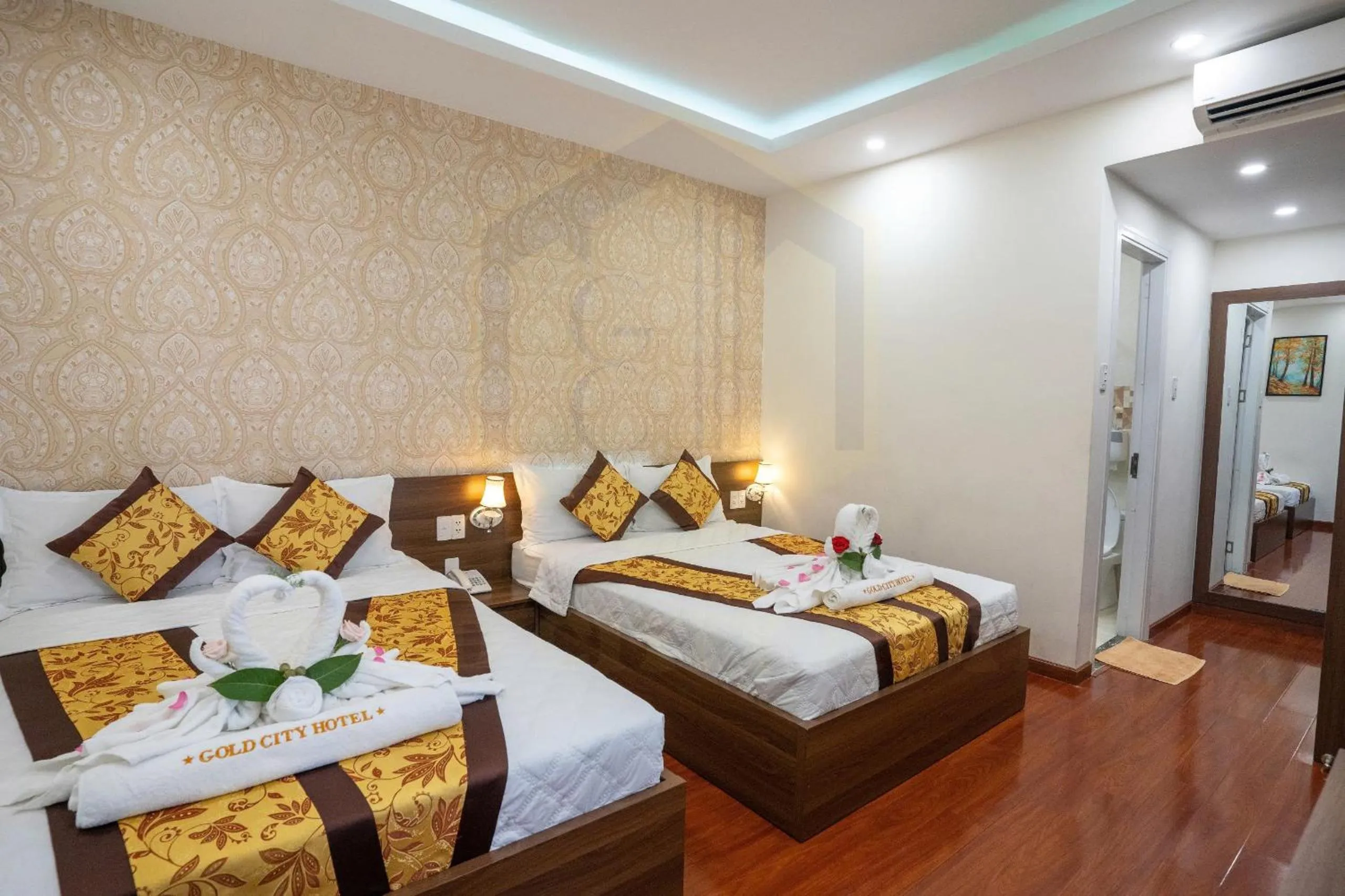 Bed in GOLD CITY Hotel