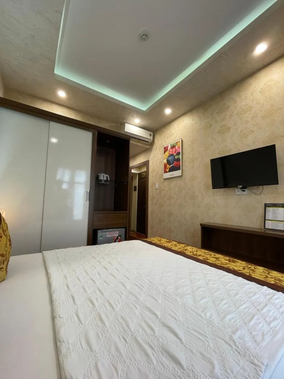 Bed in GOLD CITY Hotel
