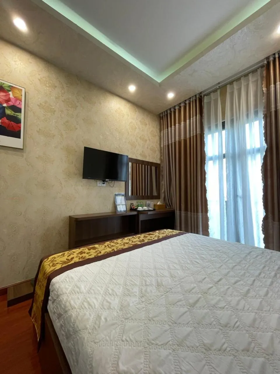 Bed in GOLD CITY Hotel