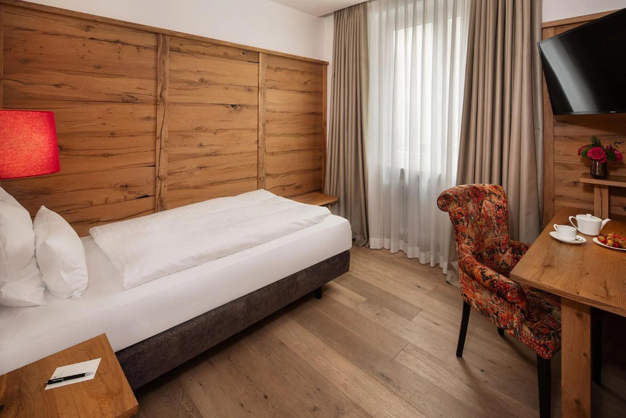 Bed in Eden Hotel Wolff