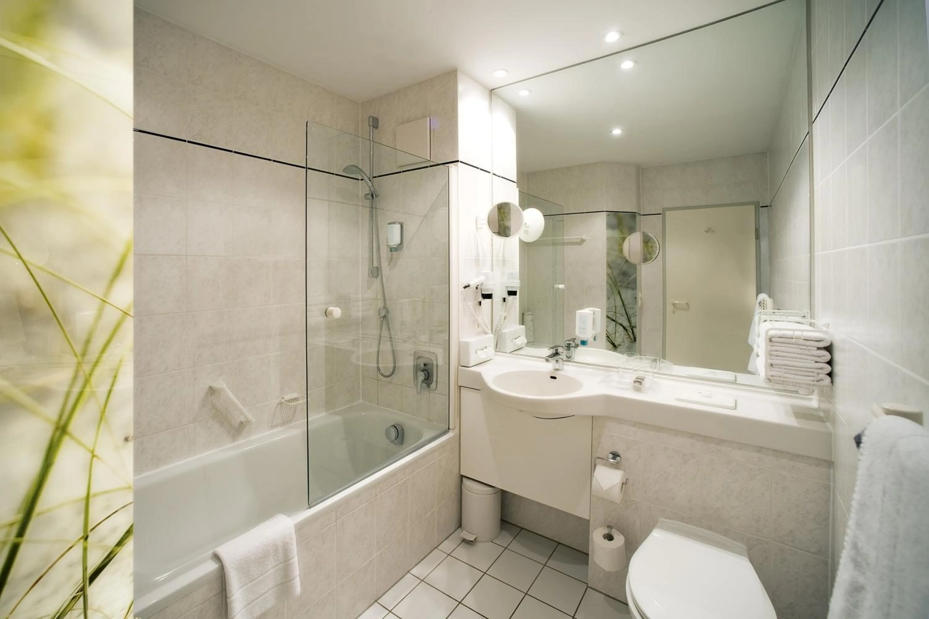 Bathroom in Holiday Inn Munich Unterhaching by IHG