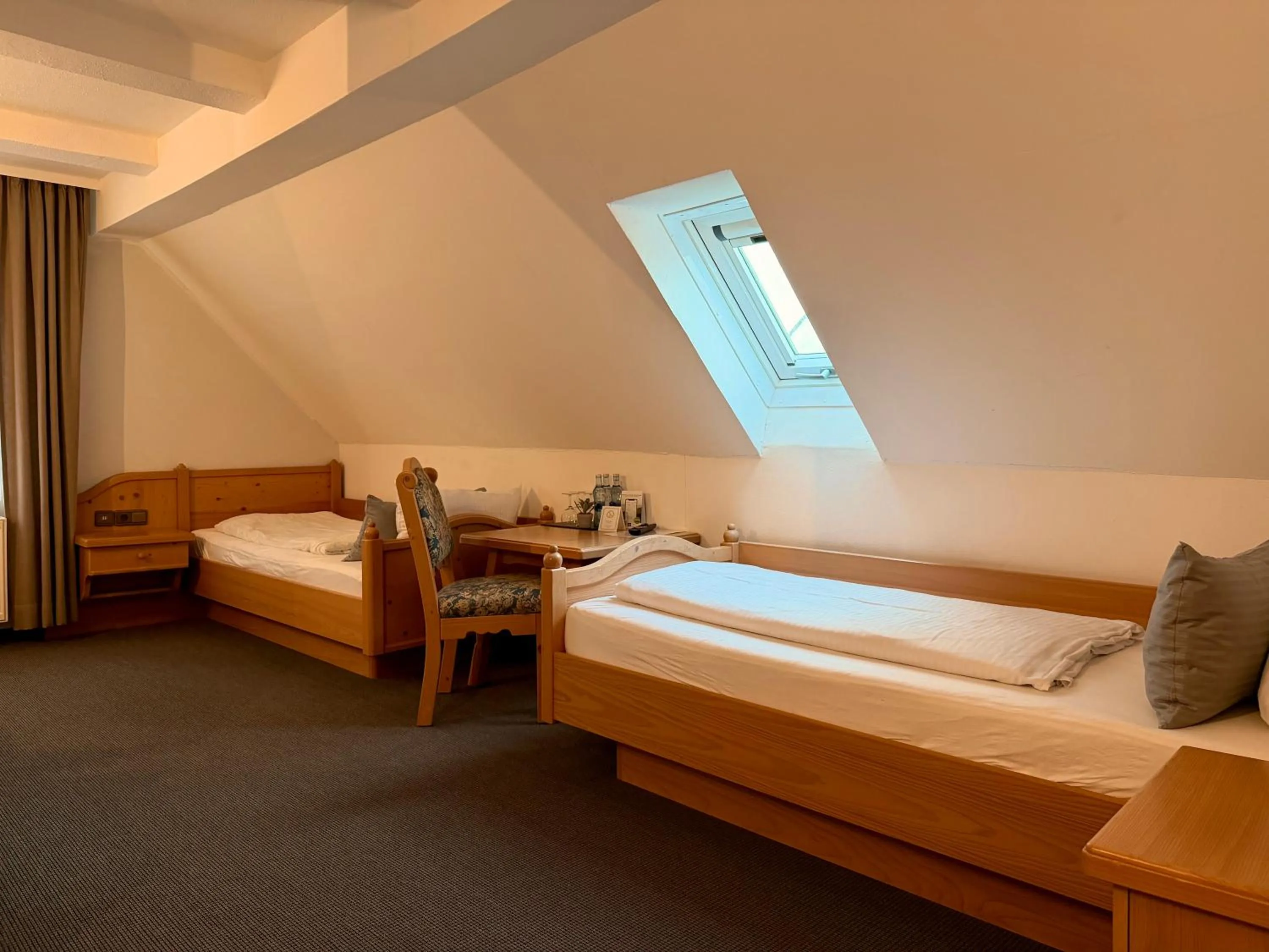 Bed in Gasthof Hotel Bräustübl und Haus Boutique