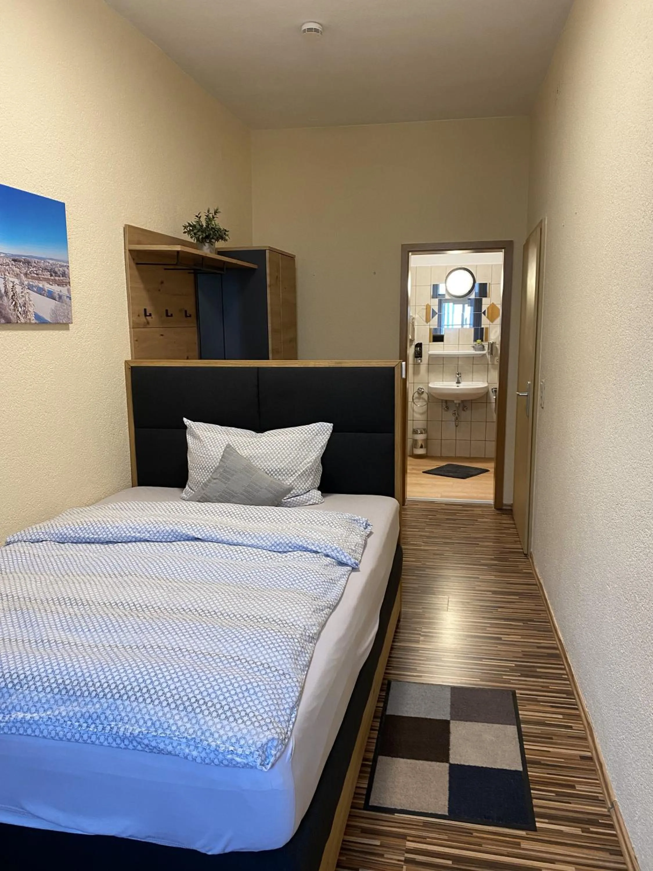 Bed in Gasthof Hotel Bräustübl und Haus Boutique