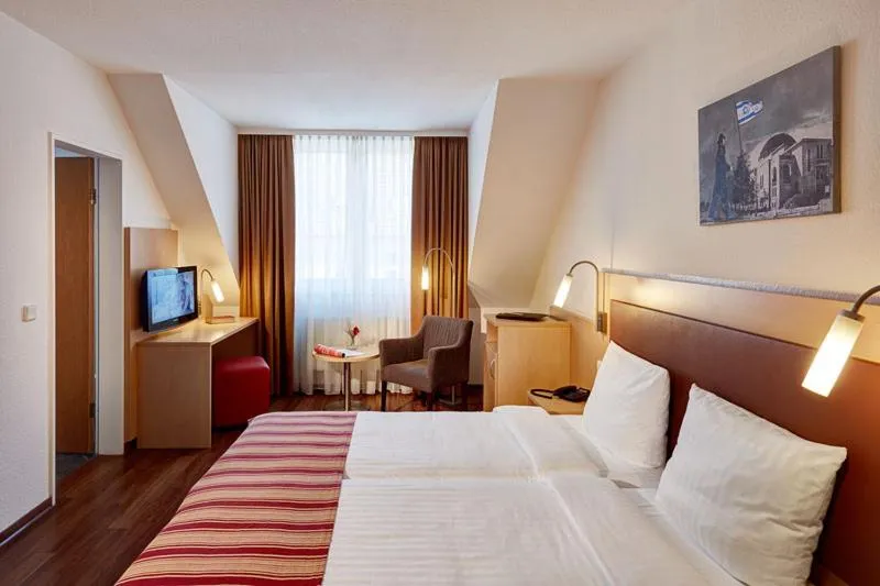 Photo of the whole room, Bed in Hotel Imperial Düsseldorf Superior - Sure Collection by Best Western