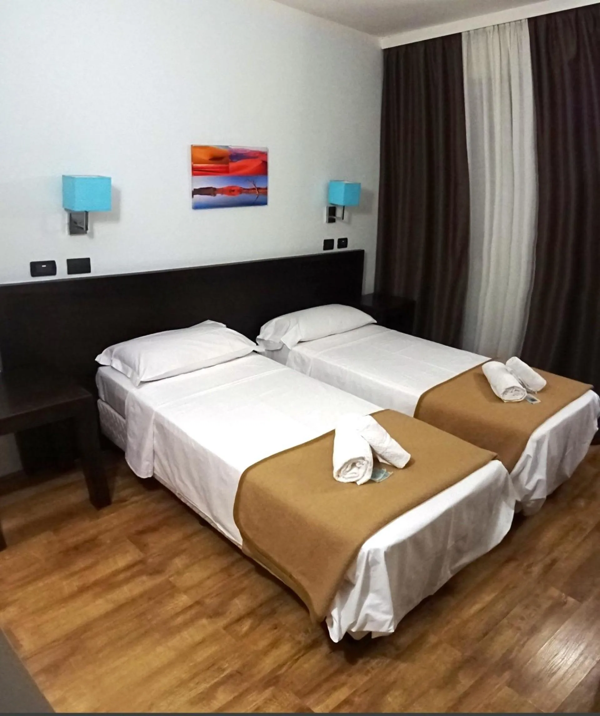 Bed in Hotel Paradiso