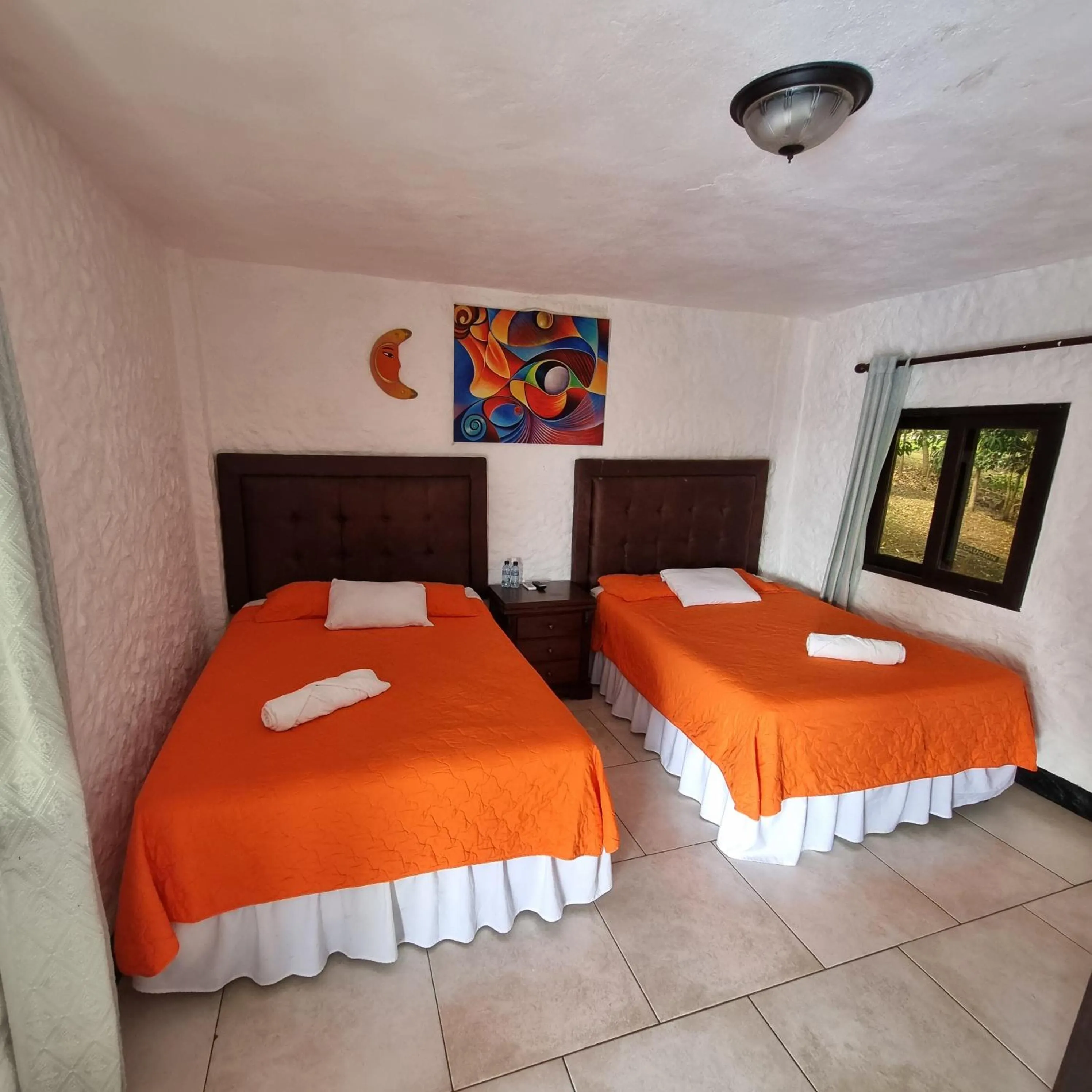 towels, Bed in Hotel Mi Paraíso Río Dulce