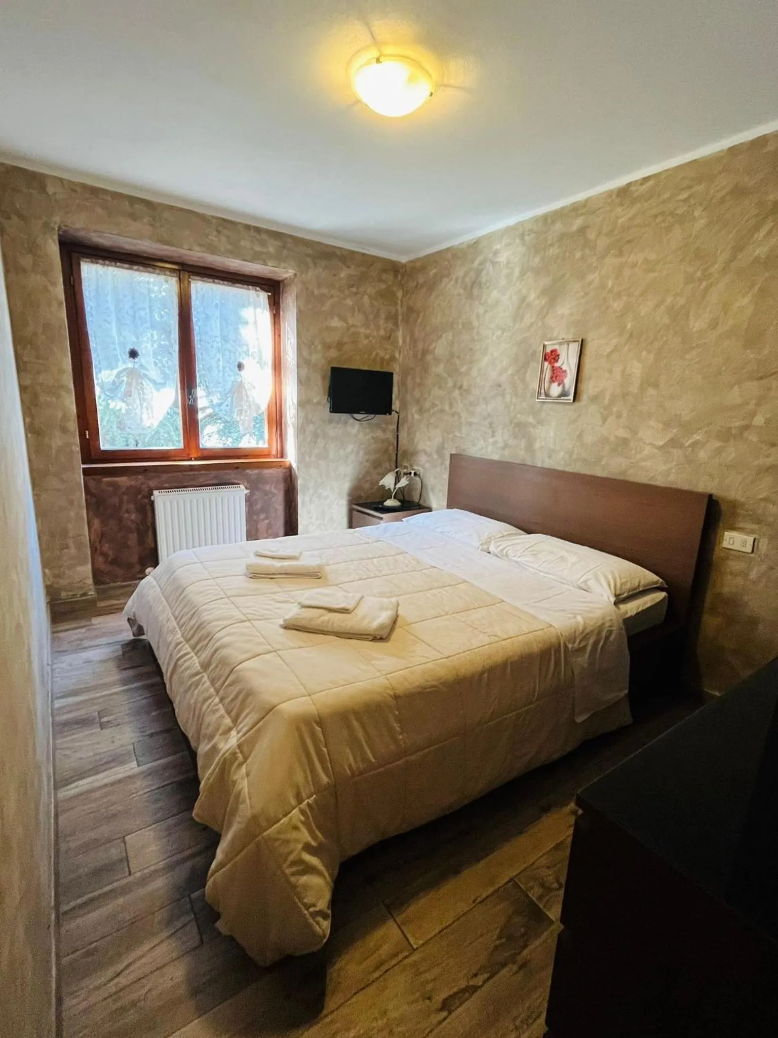 Bed in San Luigi - Rooms & Apartments