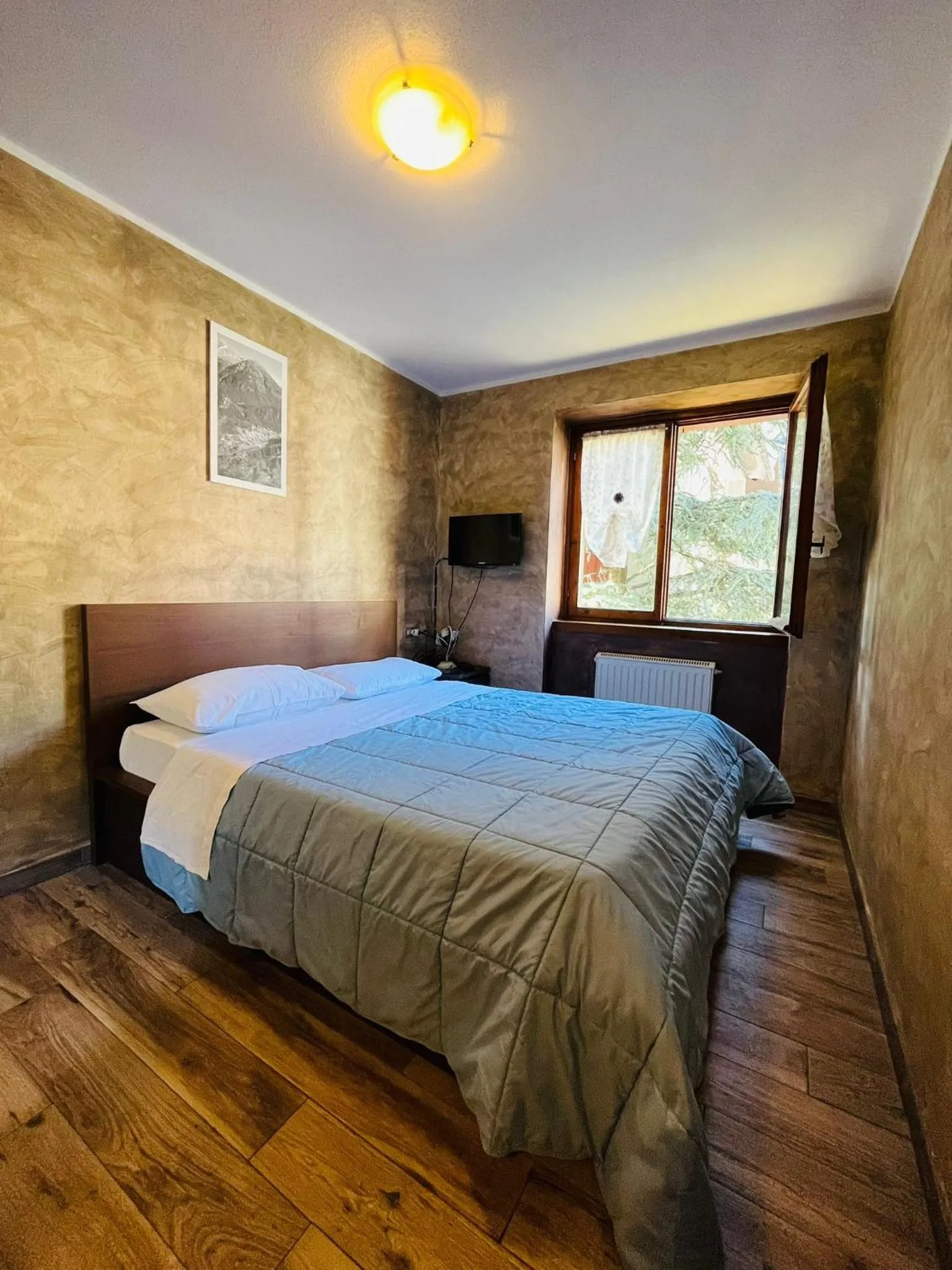 Bed in San Luigi - Rooms & Apartments