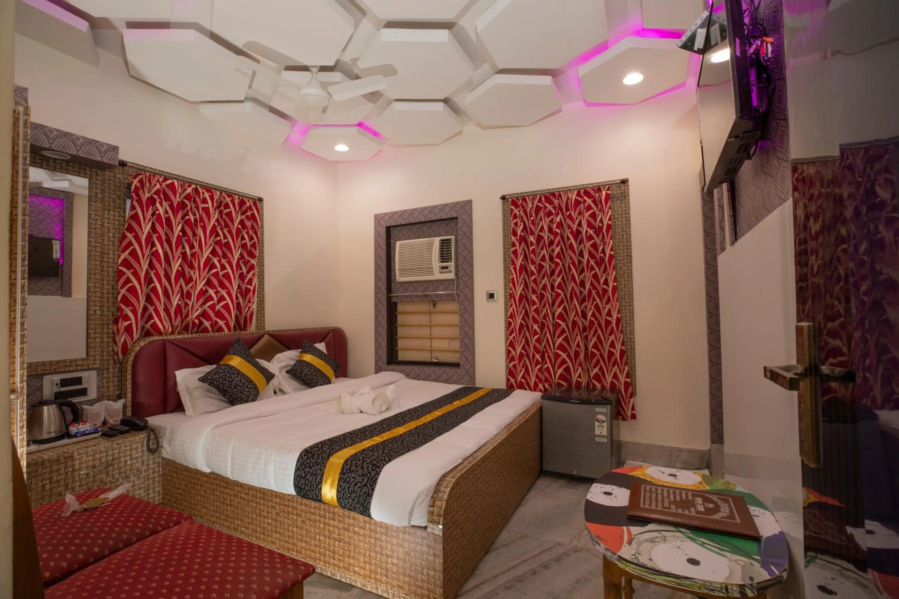 Bed in Snehamaya Spa & Resort