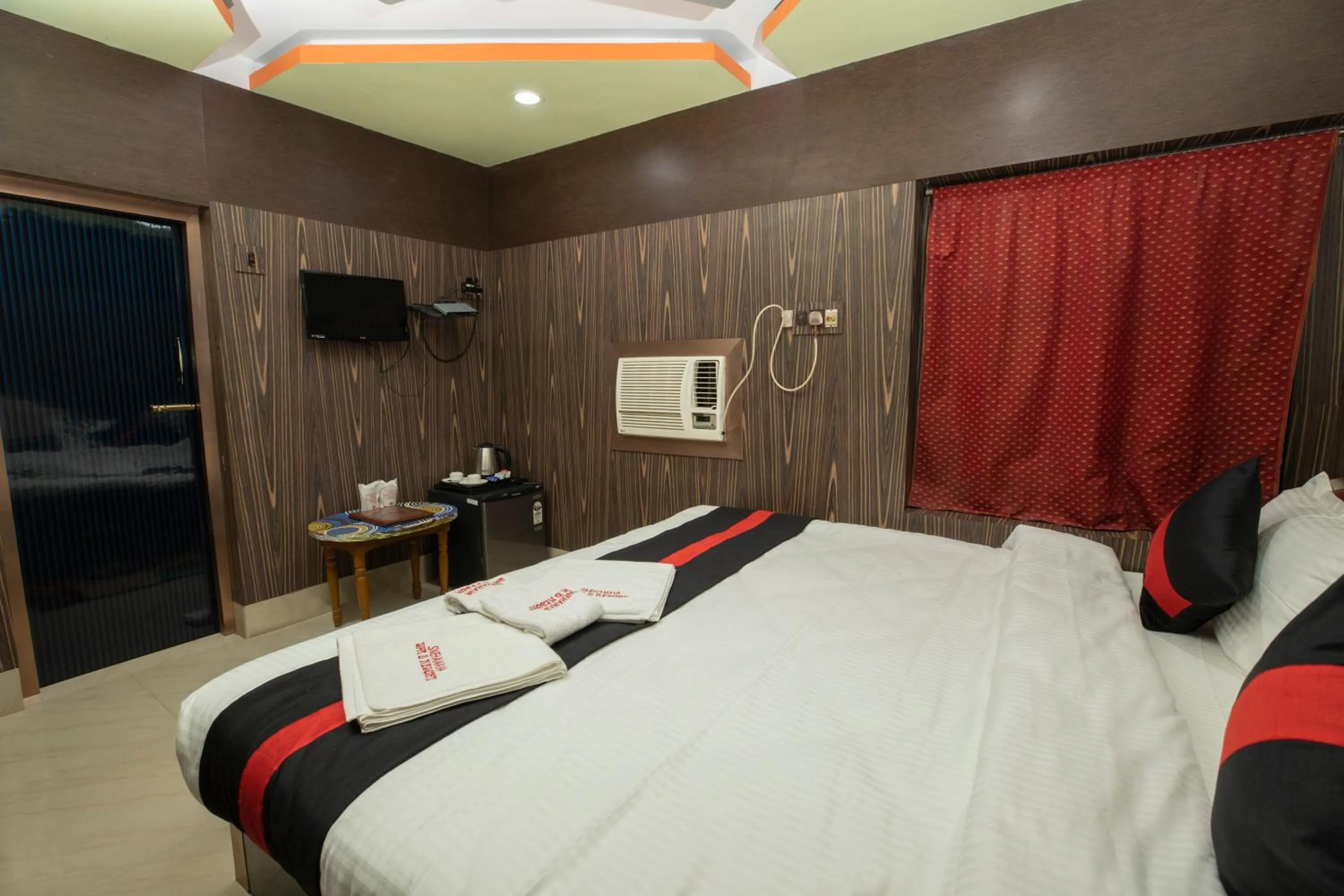 Bed in Snehamaya Spa & Resort