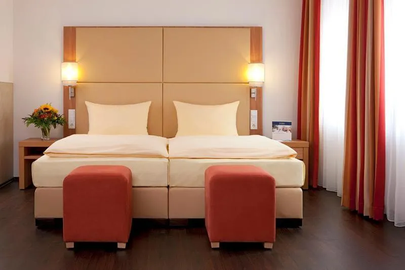 Photo of the whole room, Bed in Welcome Hotel Marburg