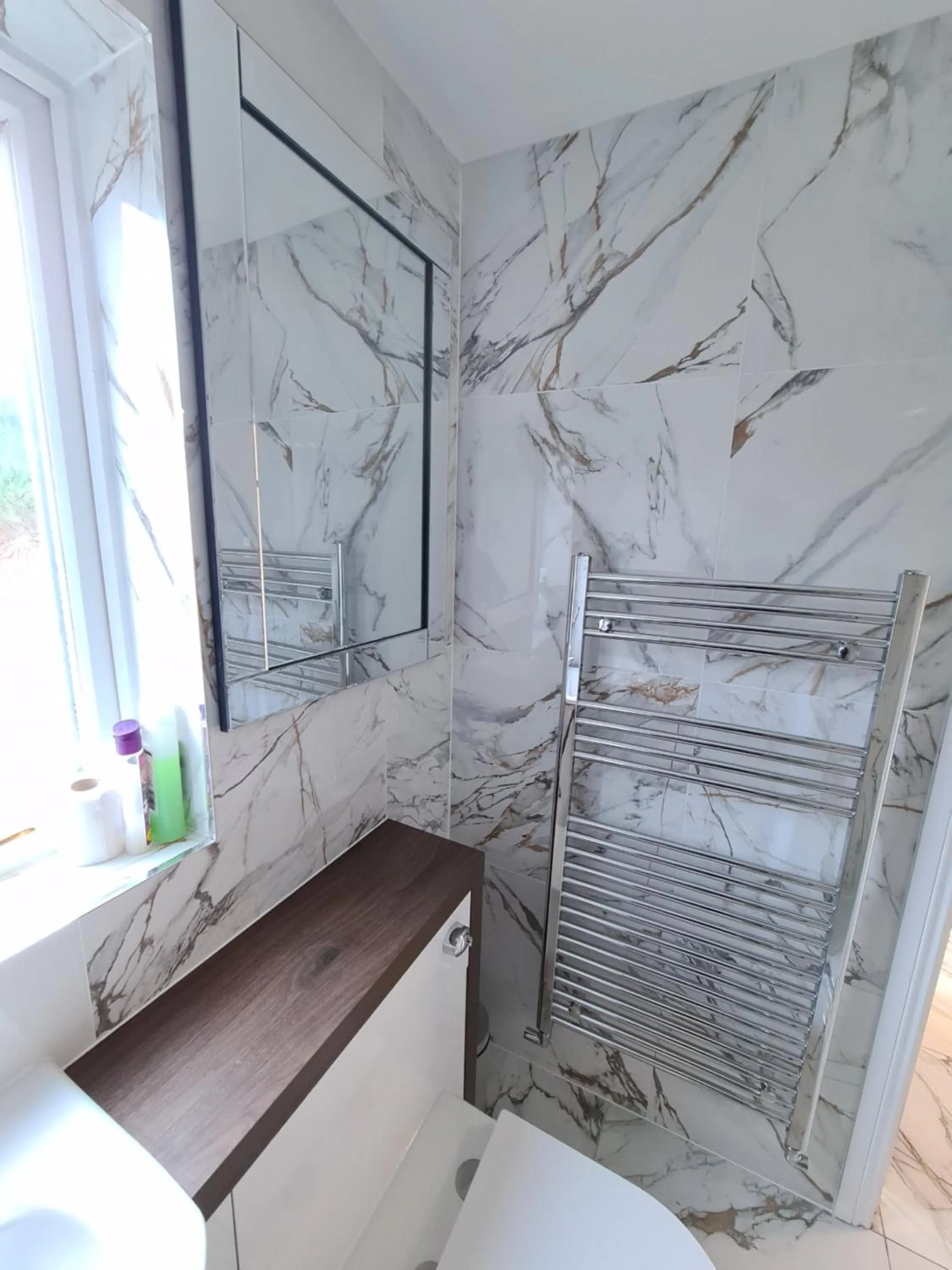 Shower in Umbrella Properties London Excel