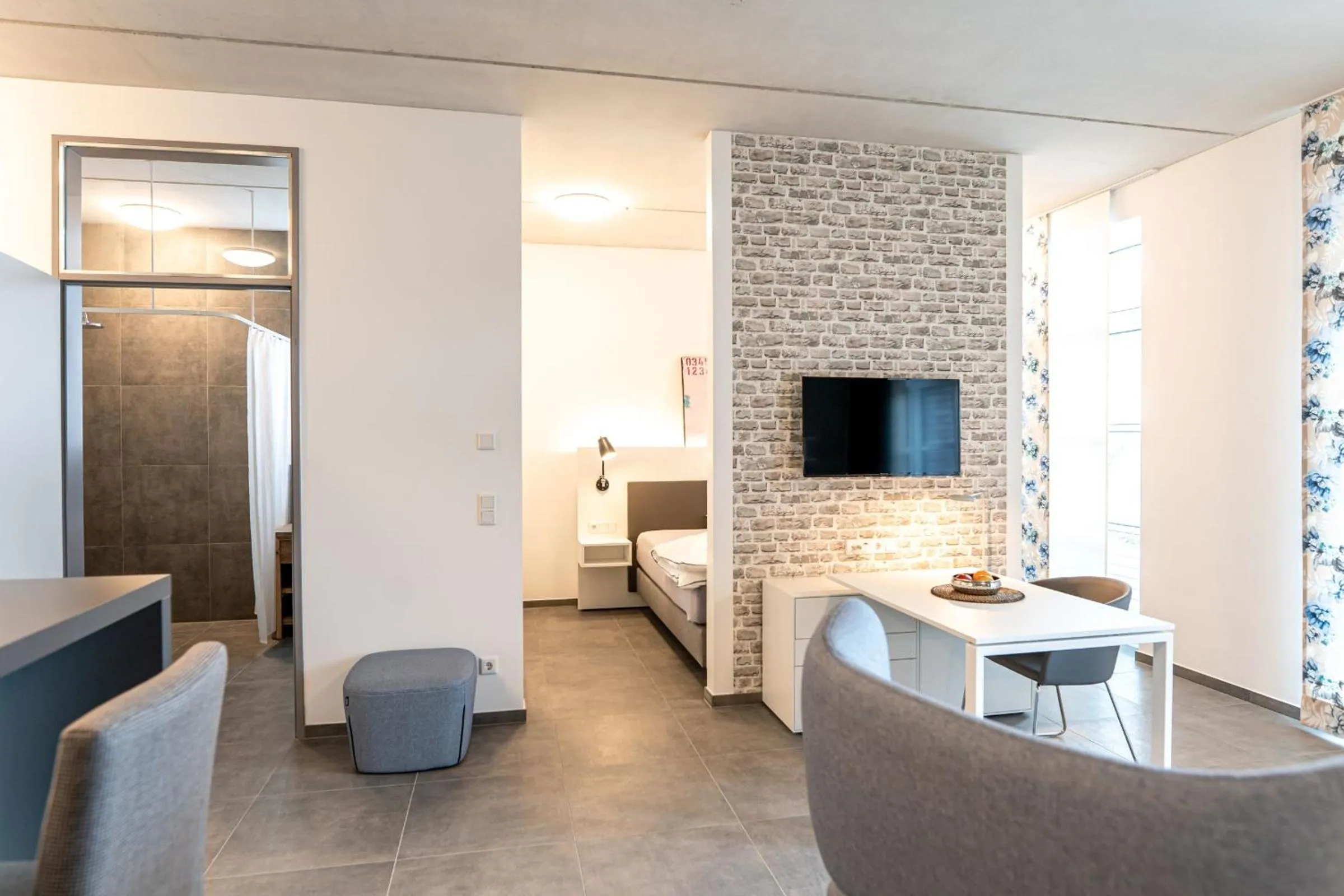 Communal lounge/ TV room, Bed in Refugium am Wasserturm