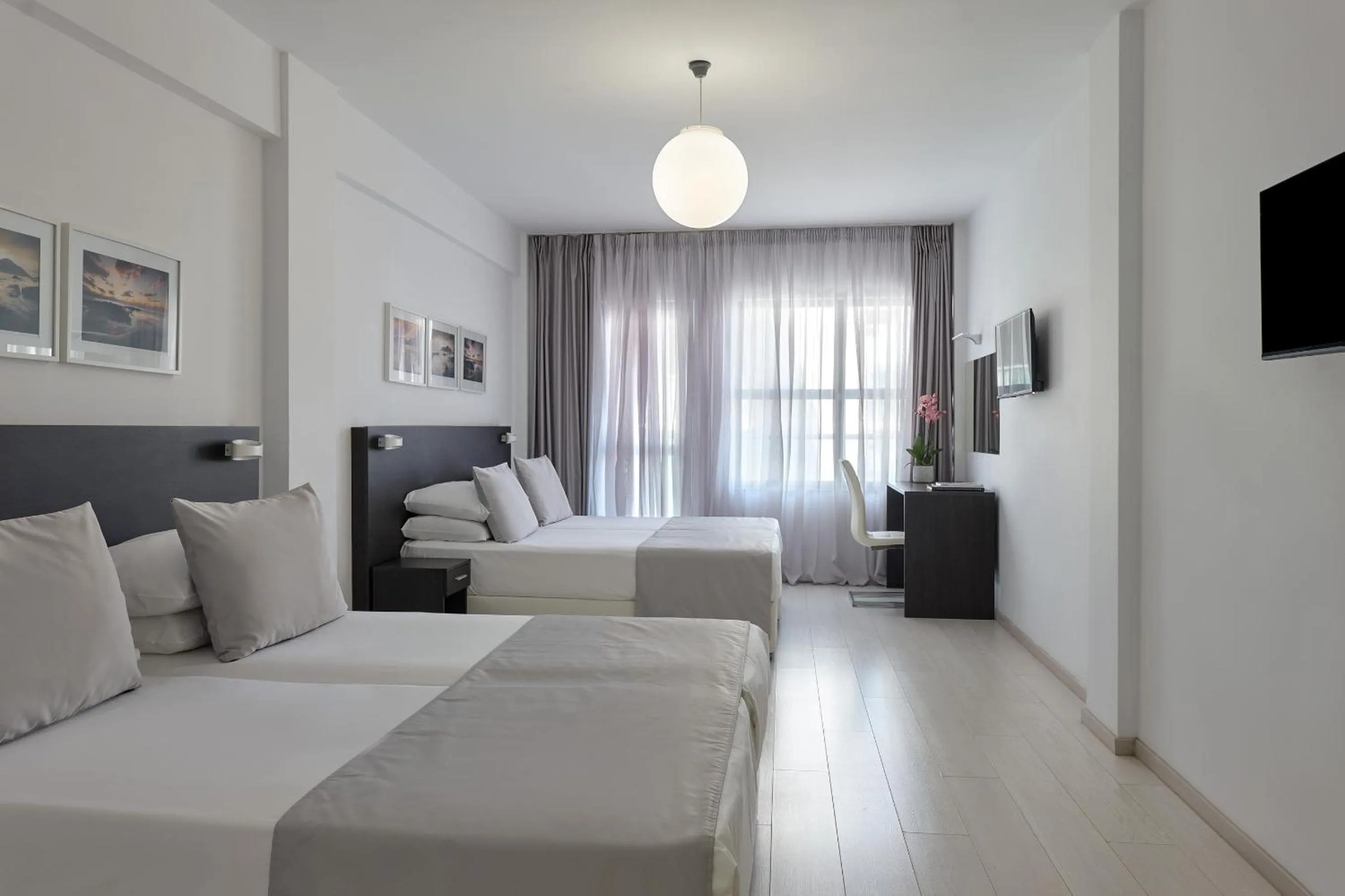 Bed in Boss Boutique Athens by Prima Hotels