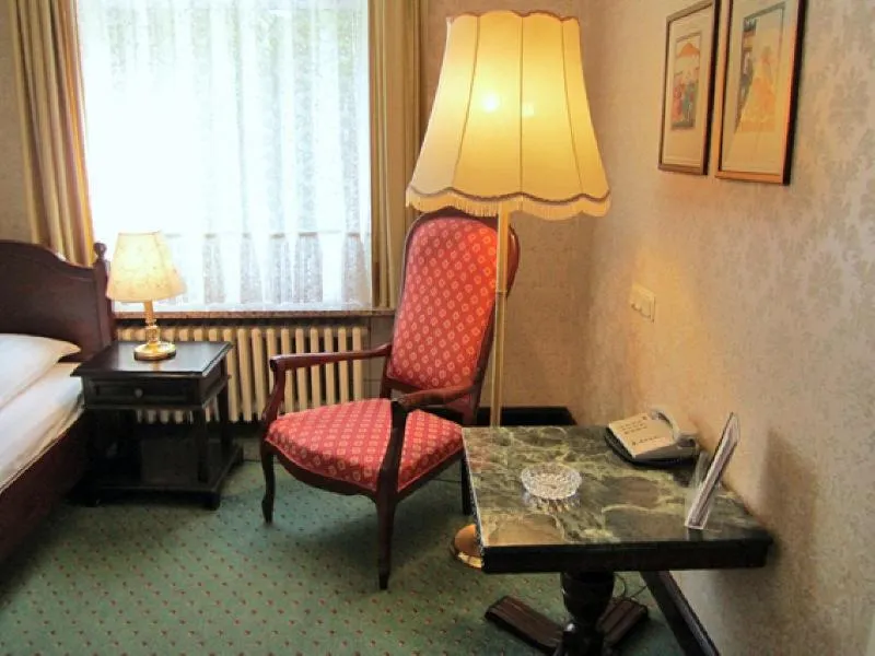 Seating area, Bed in Hotel Stephan