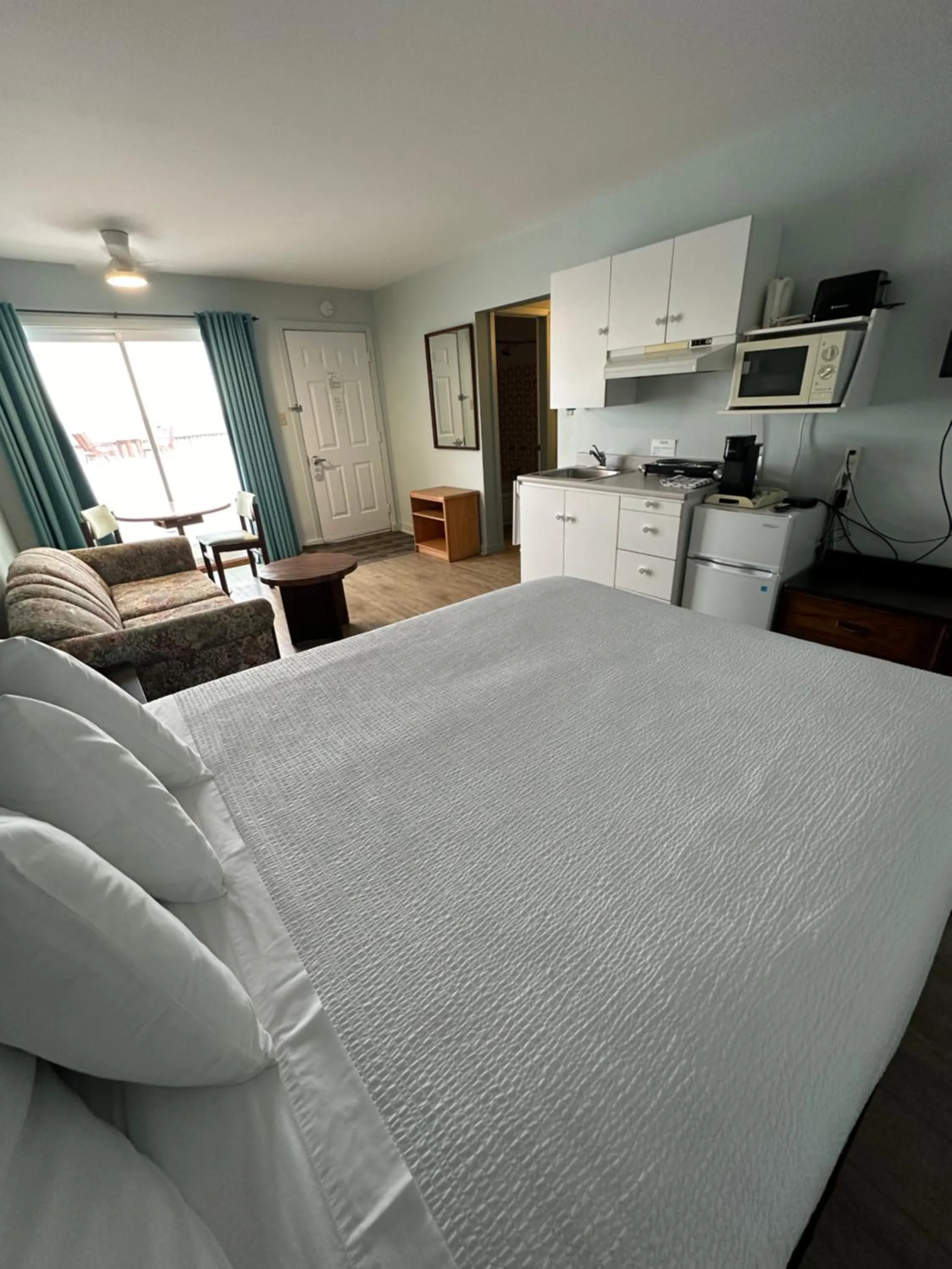 Bed in Motel Carleton Sur Mer