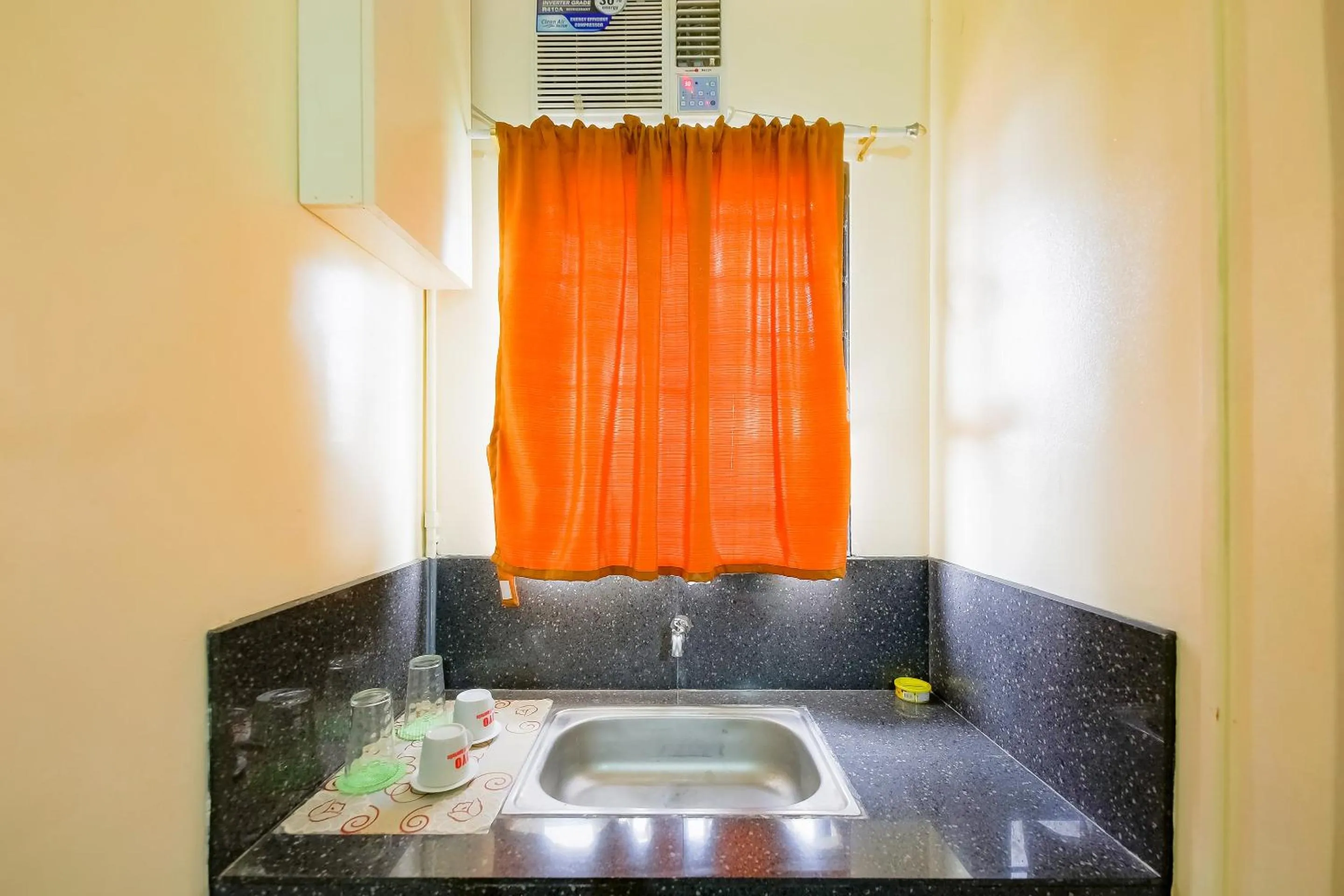 Bedroom in OYO 431 Apollo 11 Apartelle