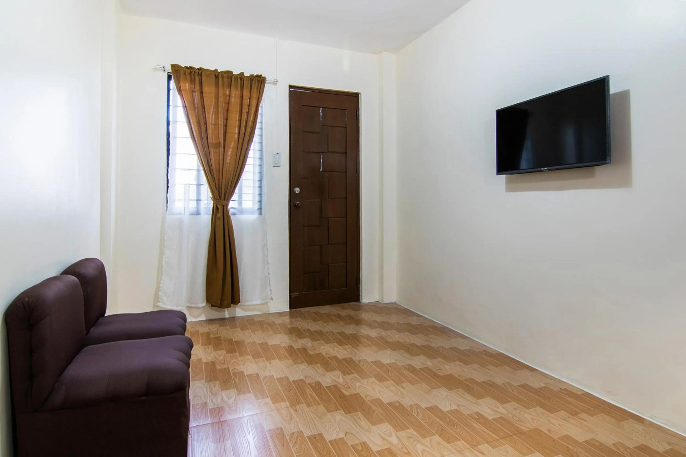 Bedroom in OYO 431 Apollo 11 Apartelle