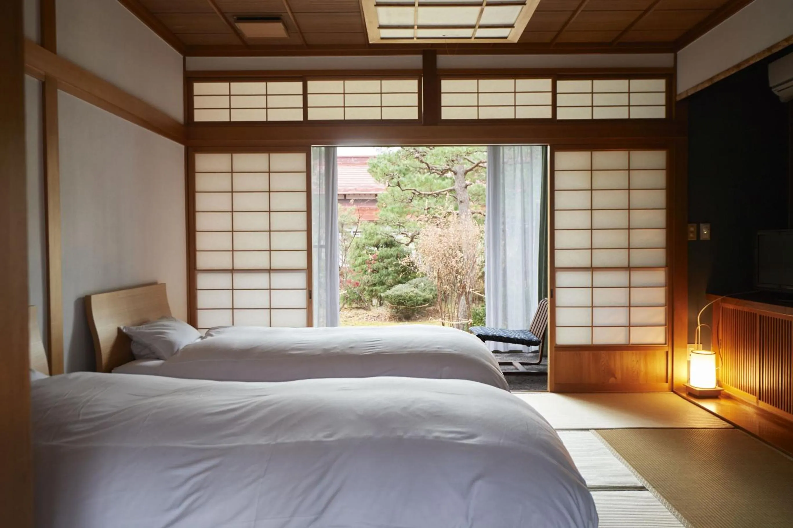 Bed in Takamiya Ryokan Sagiya Sansorai