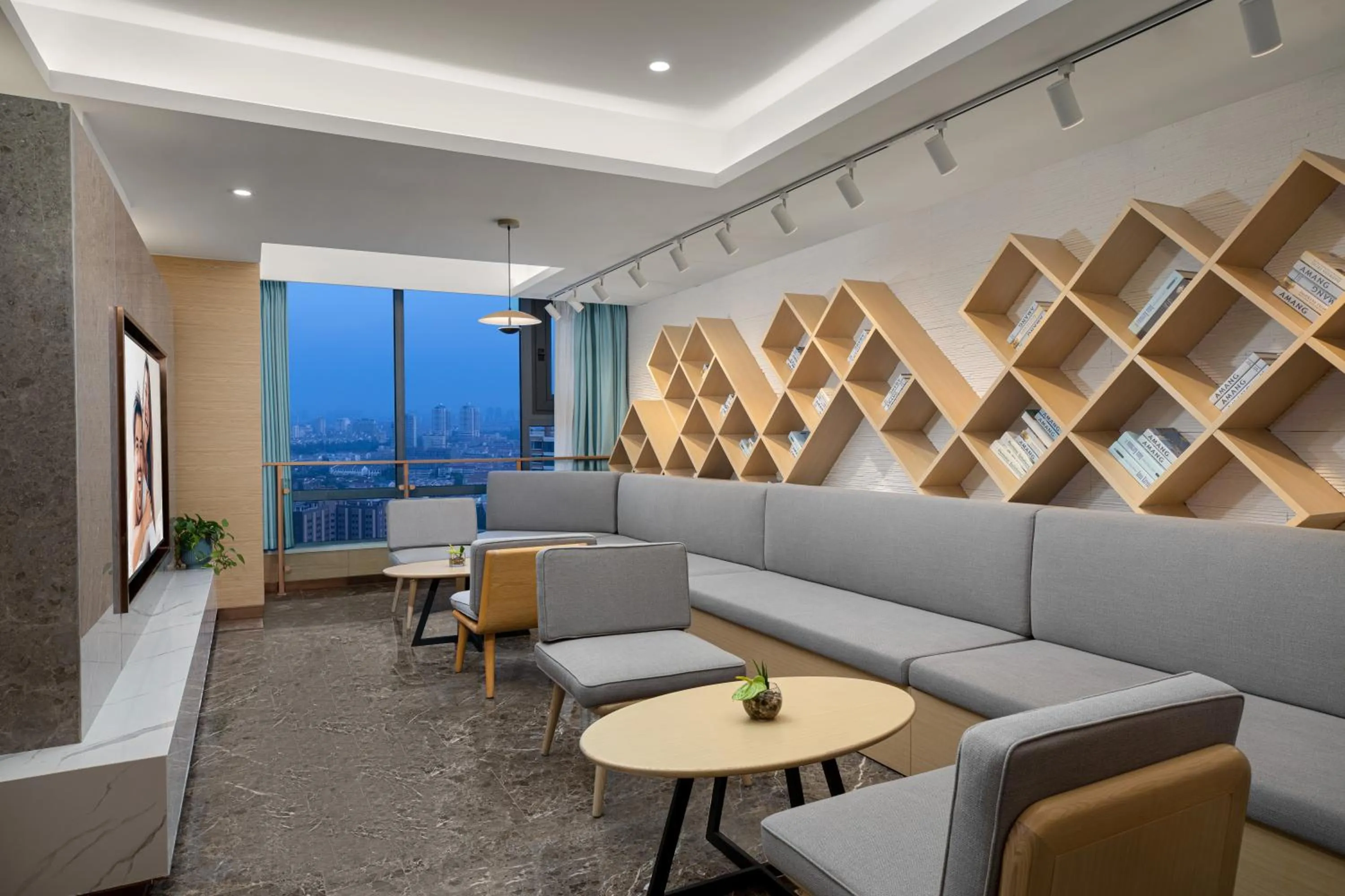 Communal lounge/ TV room in Joysuites Nantong