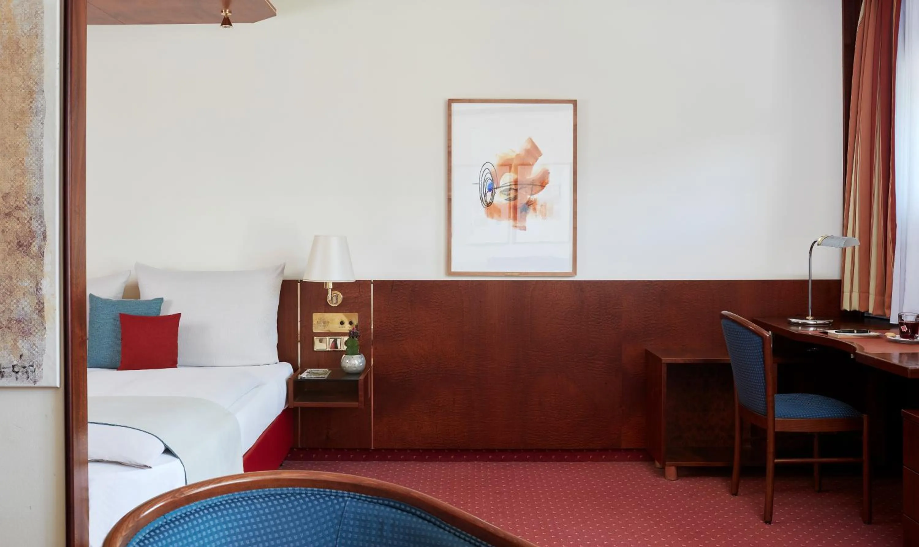 Bed in Living Hotel Weißensee