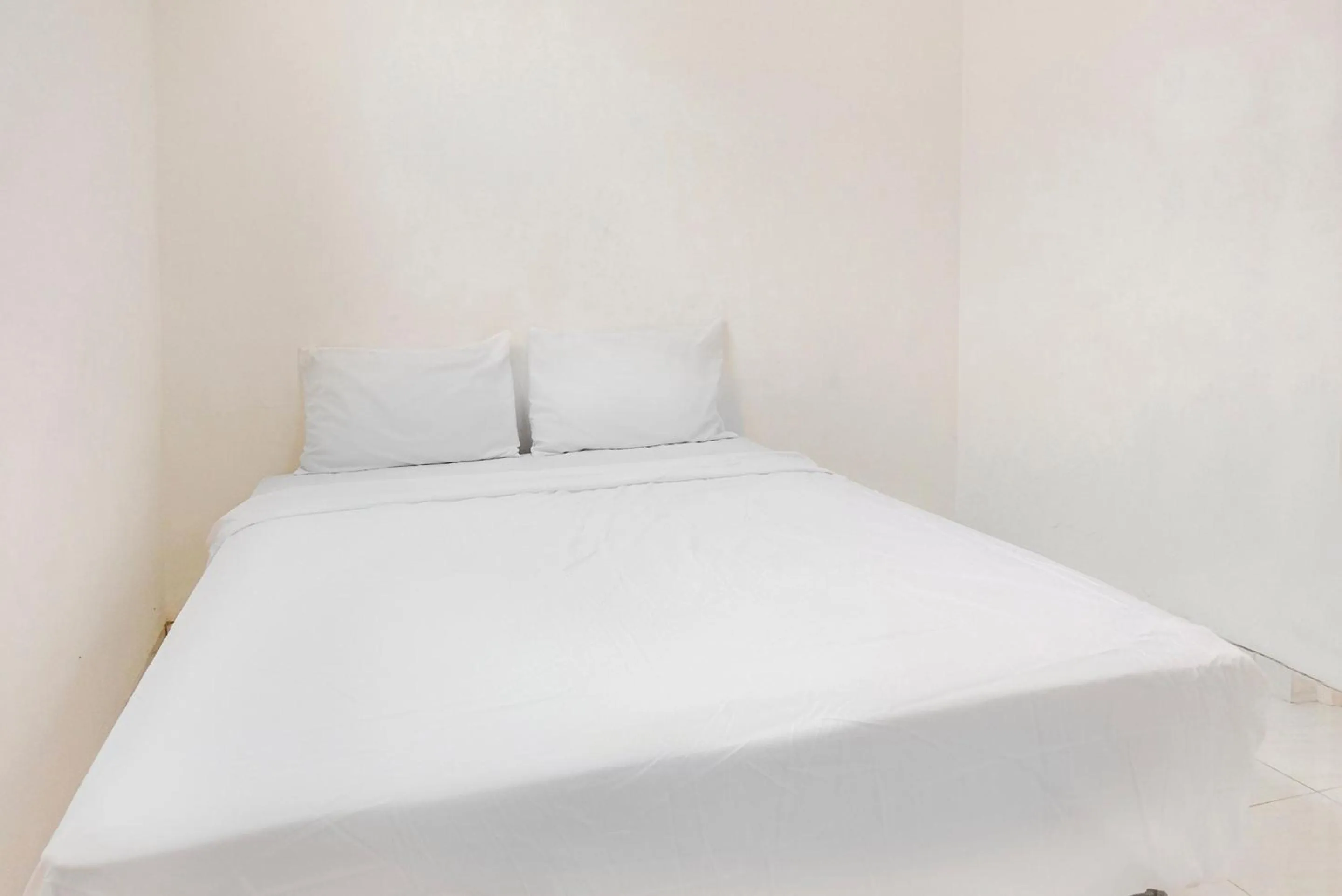 Bedroom in OYO Life 2760 Kost Simpang Borobudur 47