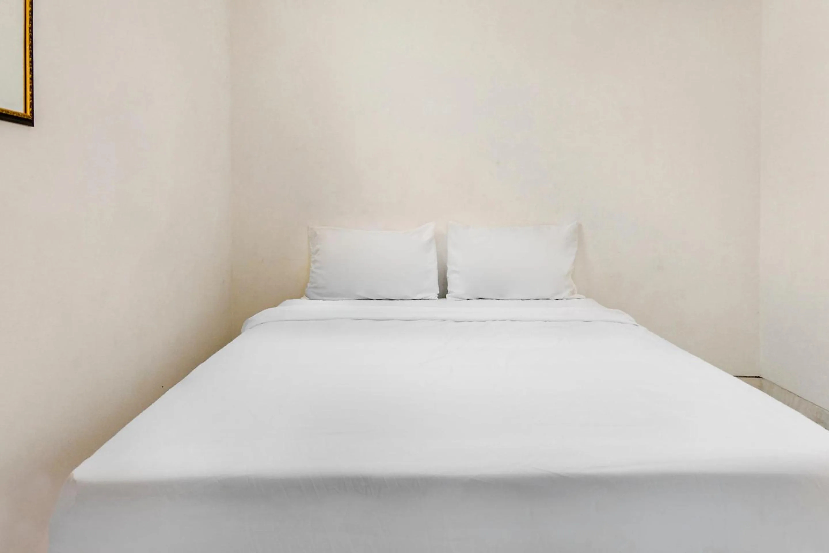 Bedroom in OYO Life 2760 Kost Simpang Borobudur 47