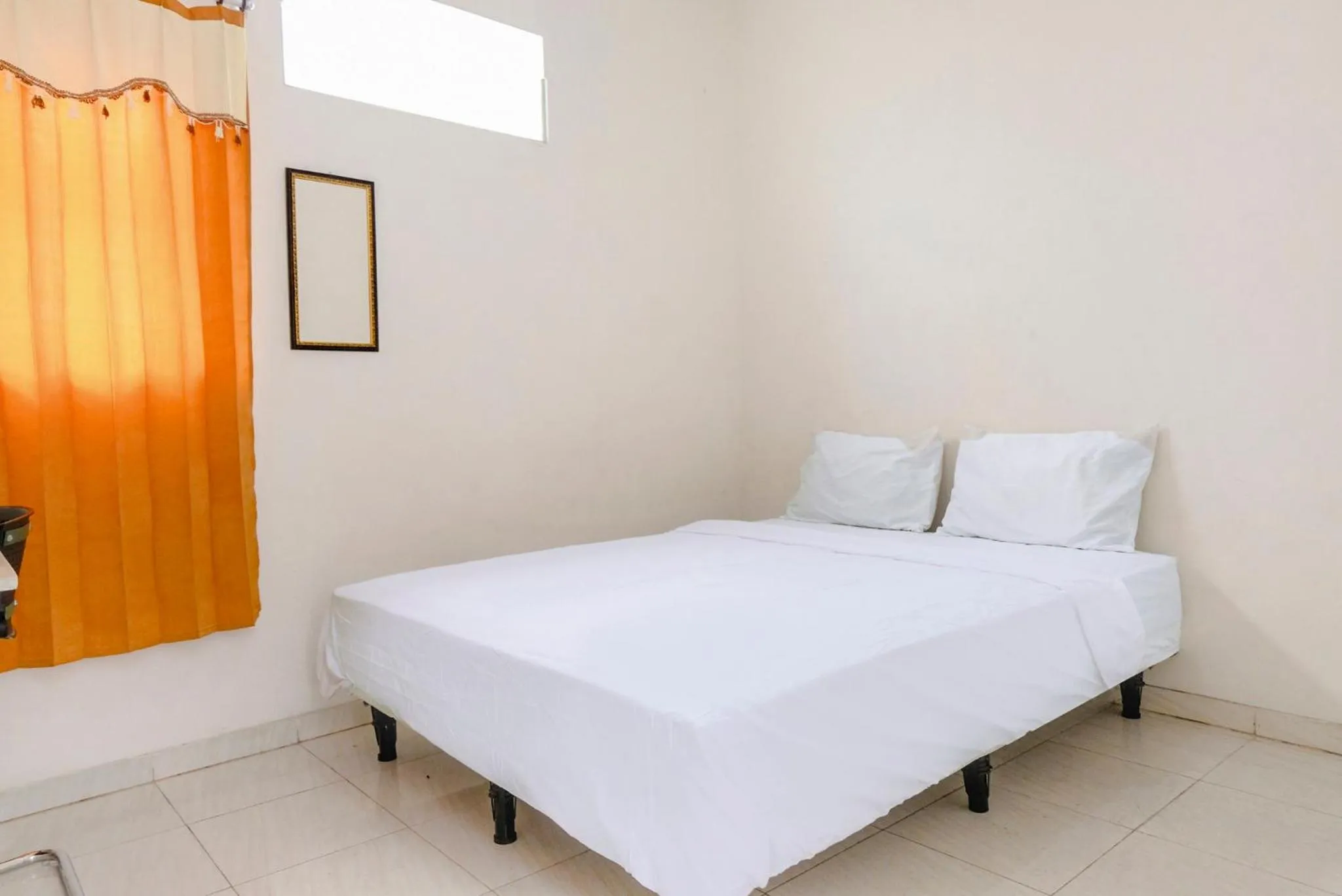 Bedroom in OYO Life 2760 Kost Simpang Borobudur 47