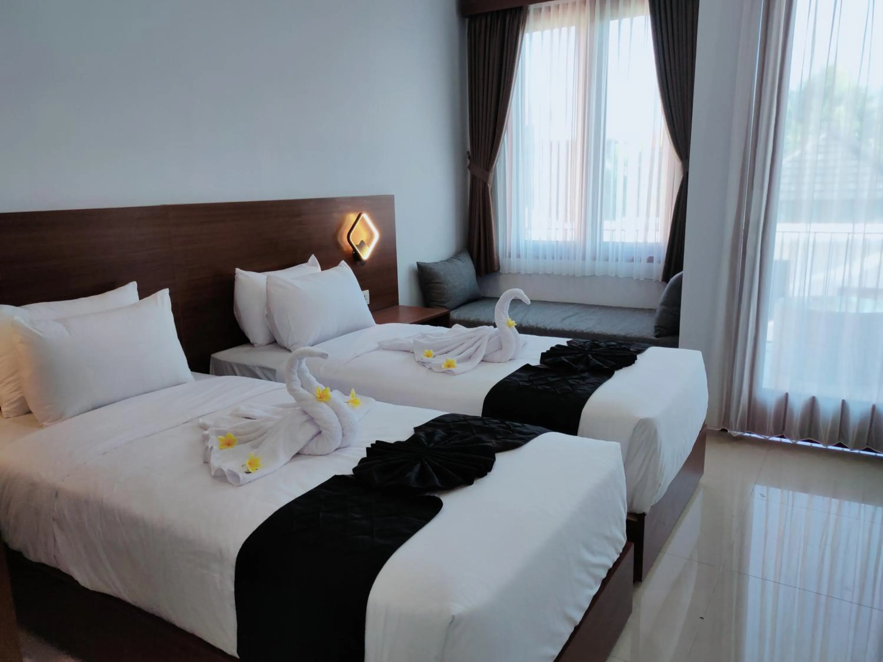 Bed in Pondok DenAyu Homestay