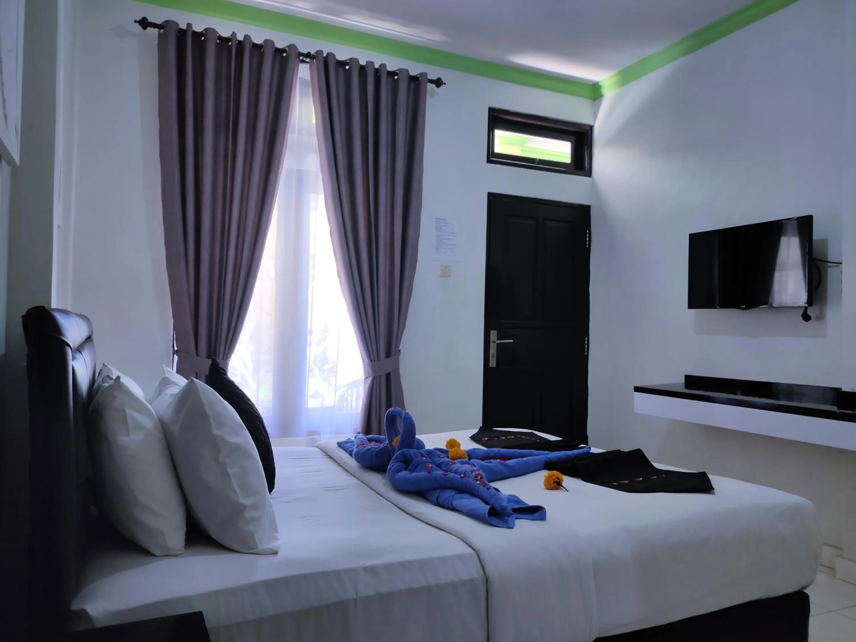 Photo of the whole room, Bed in Pondok DenAyu Homestay