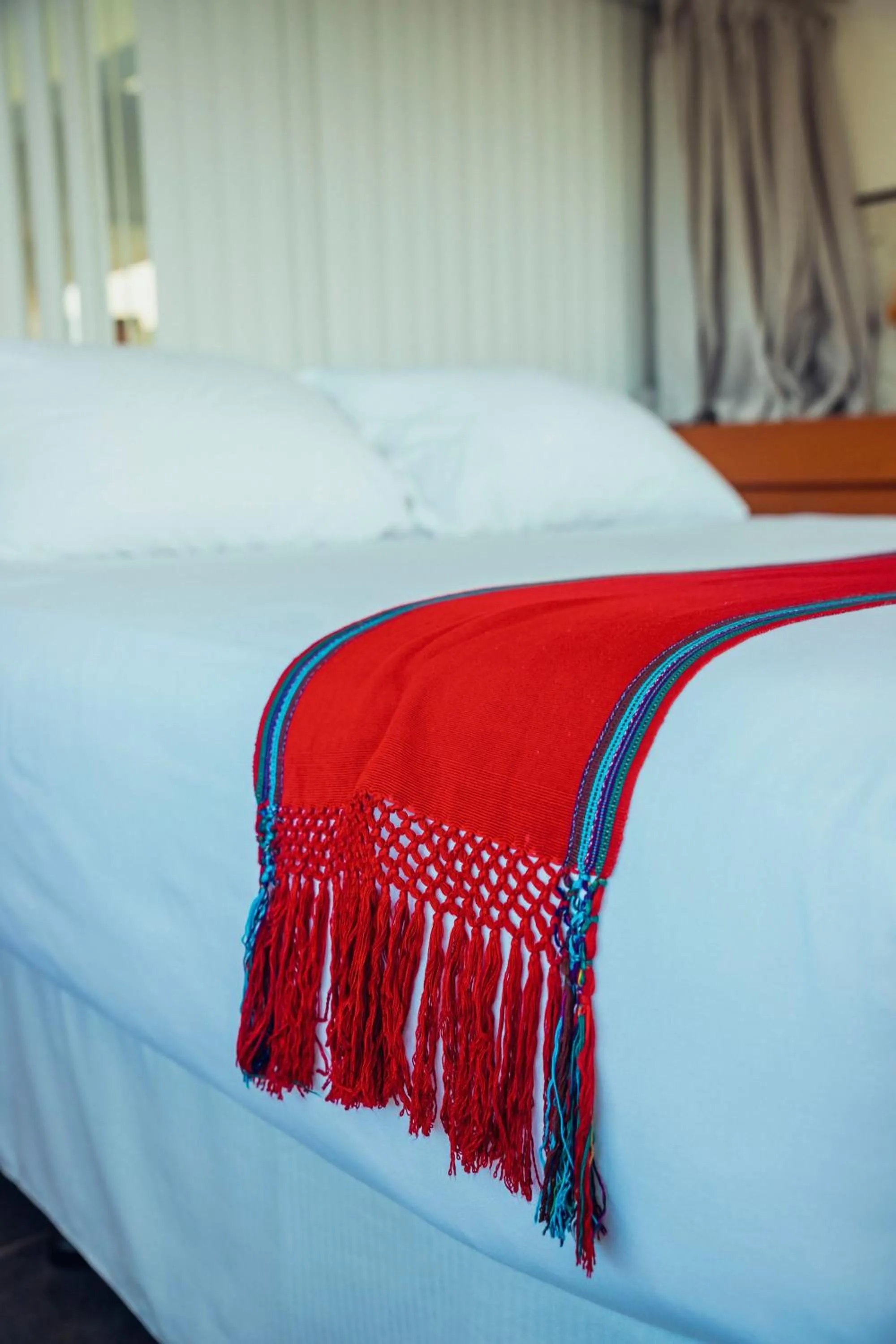 Bed in El Dragon Hotel