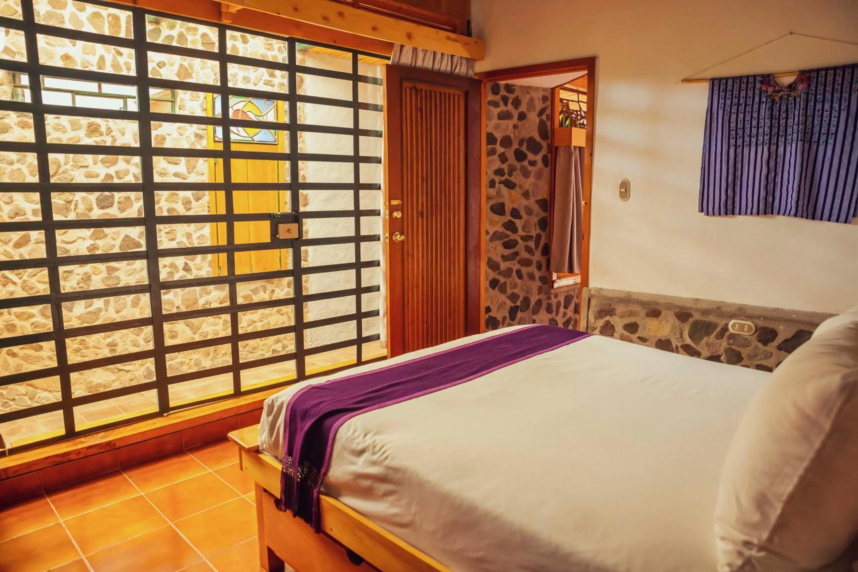 Bed in El Dragon Hotel