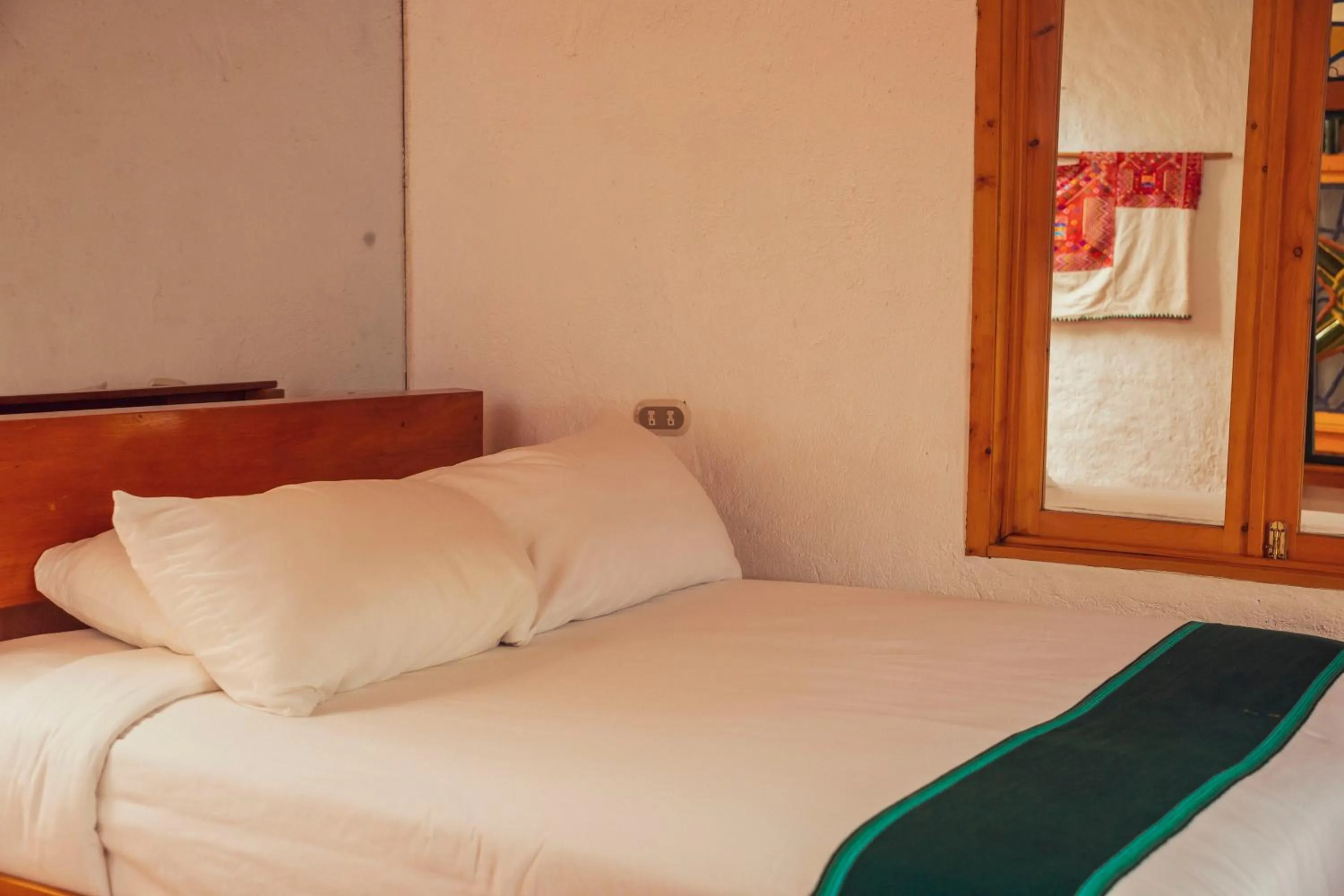 Bed in El Dragon Hotel