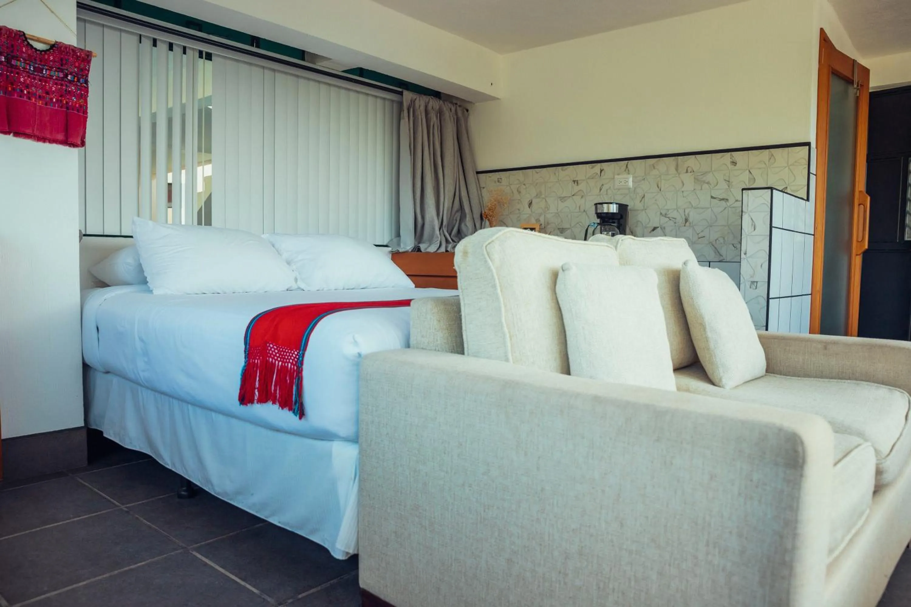 Bed in El Dragon Hotel