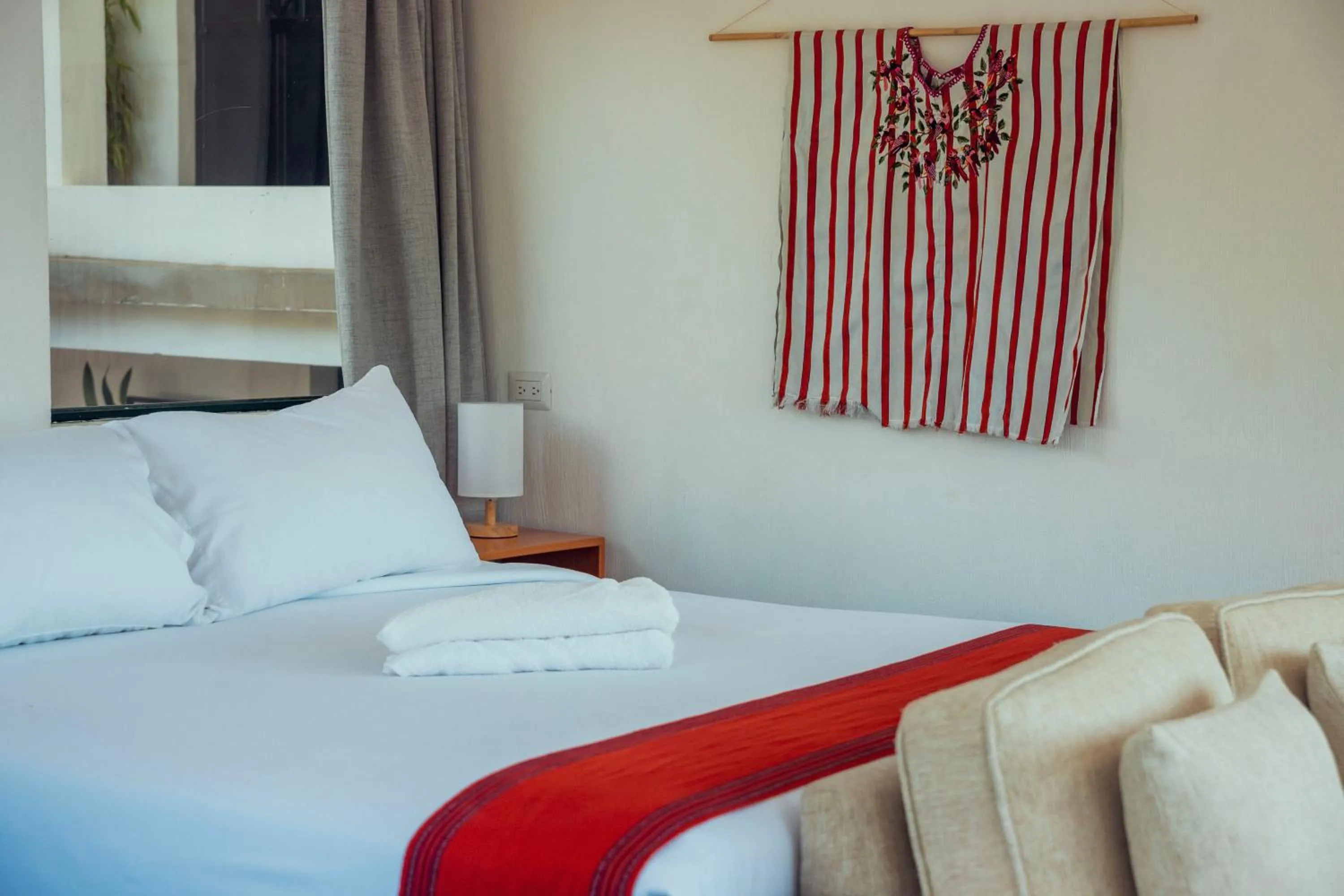 Bed in El Dragon Hotel