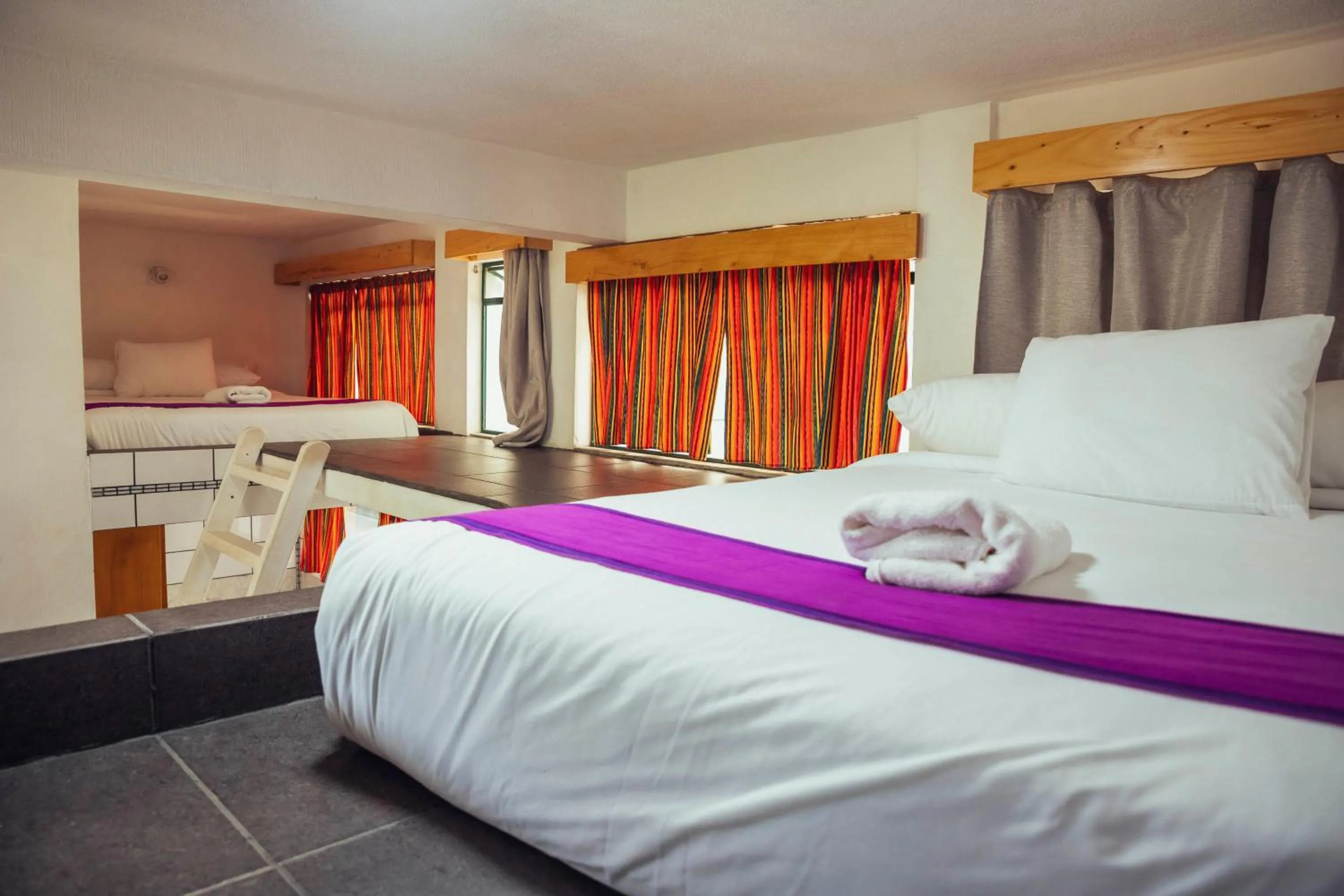 Bed in El Dragon Hotel