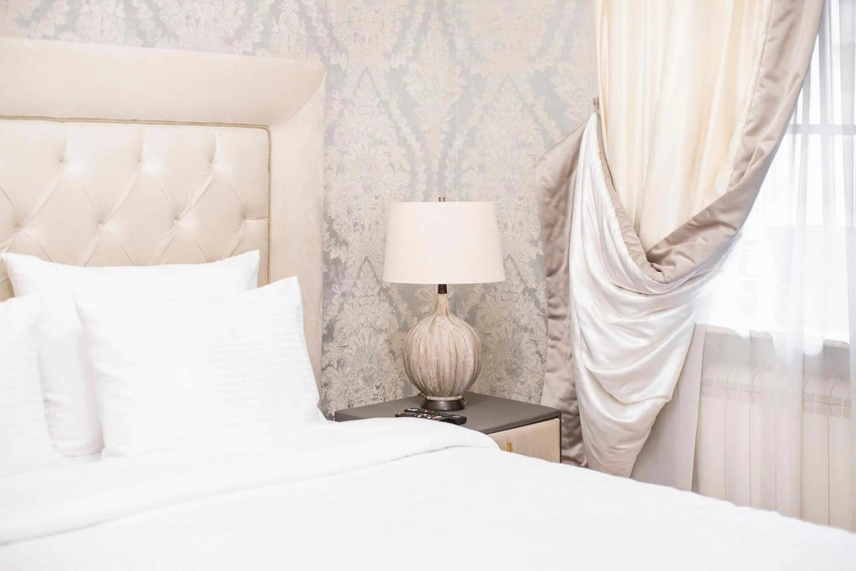 Bed in Eclat Luxury Hotel