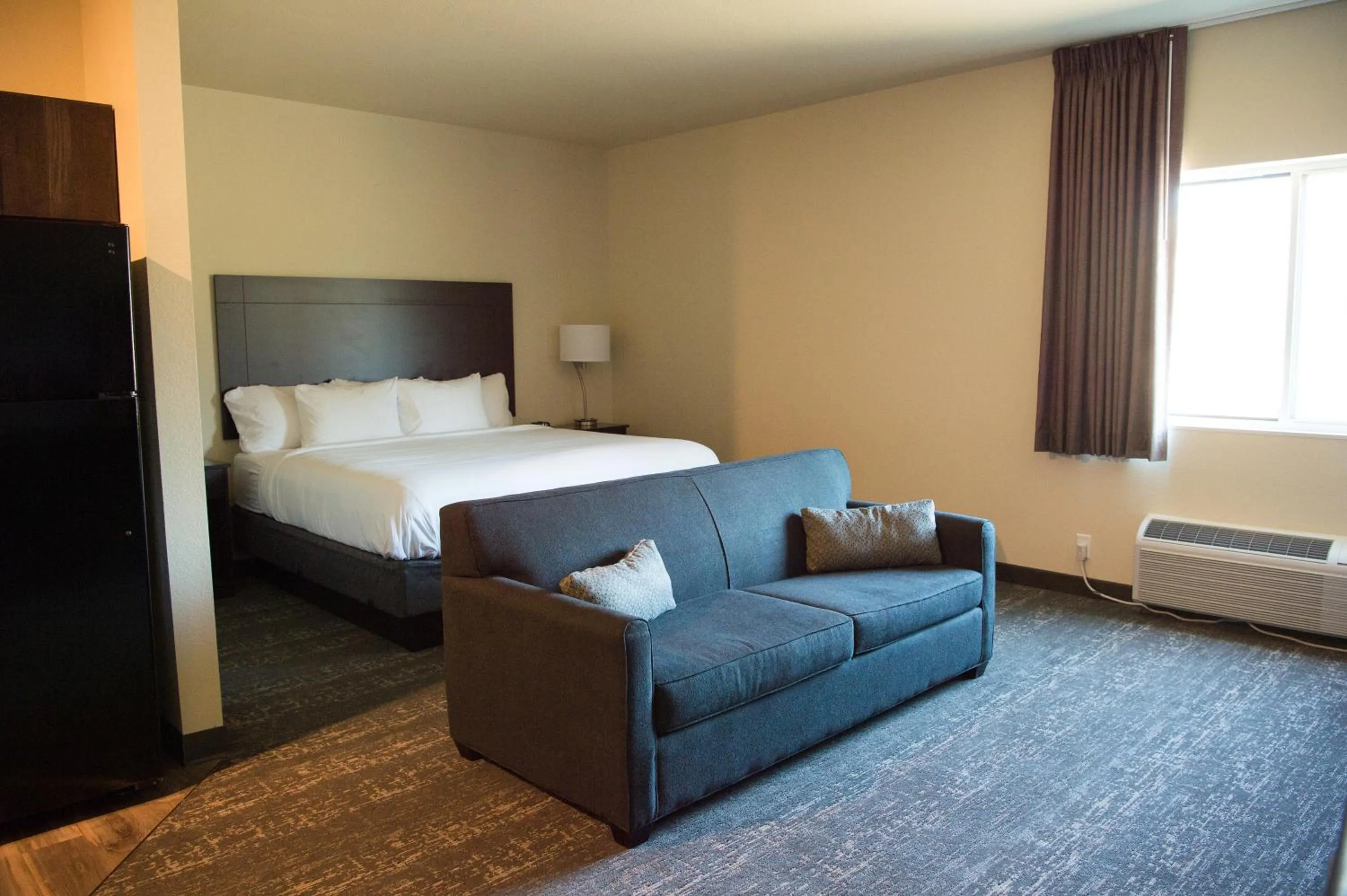 Bed in Cobblestone Inn & Suites - Forest City