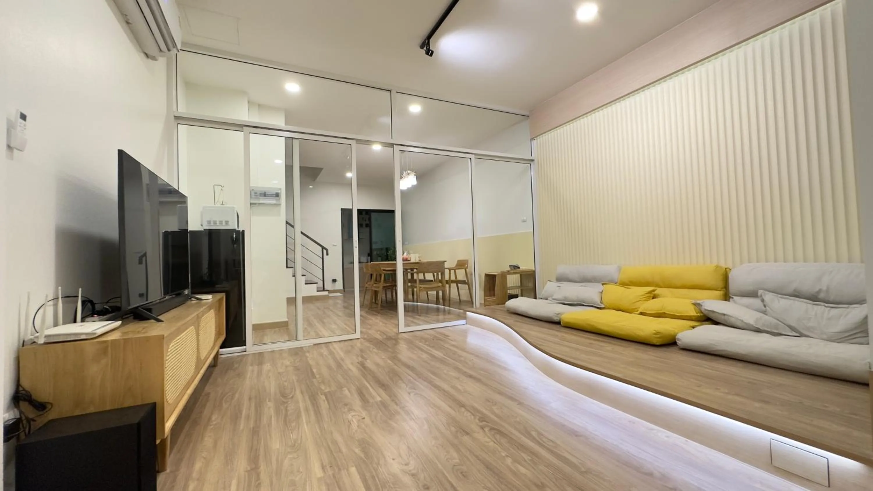 Living room, Bed in PaperPlaneCNX @ Haiya - 3 Storey Flowery Loft