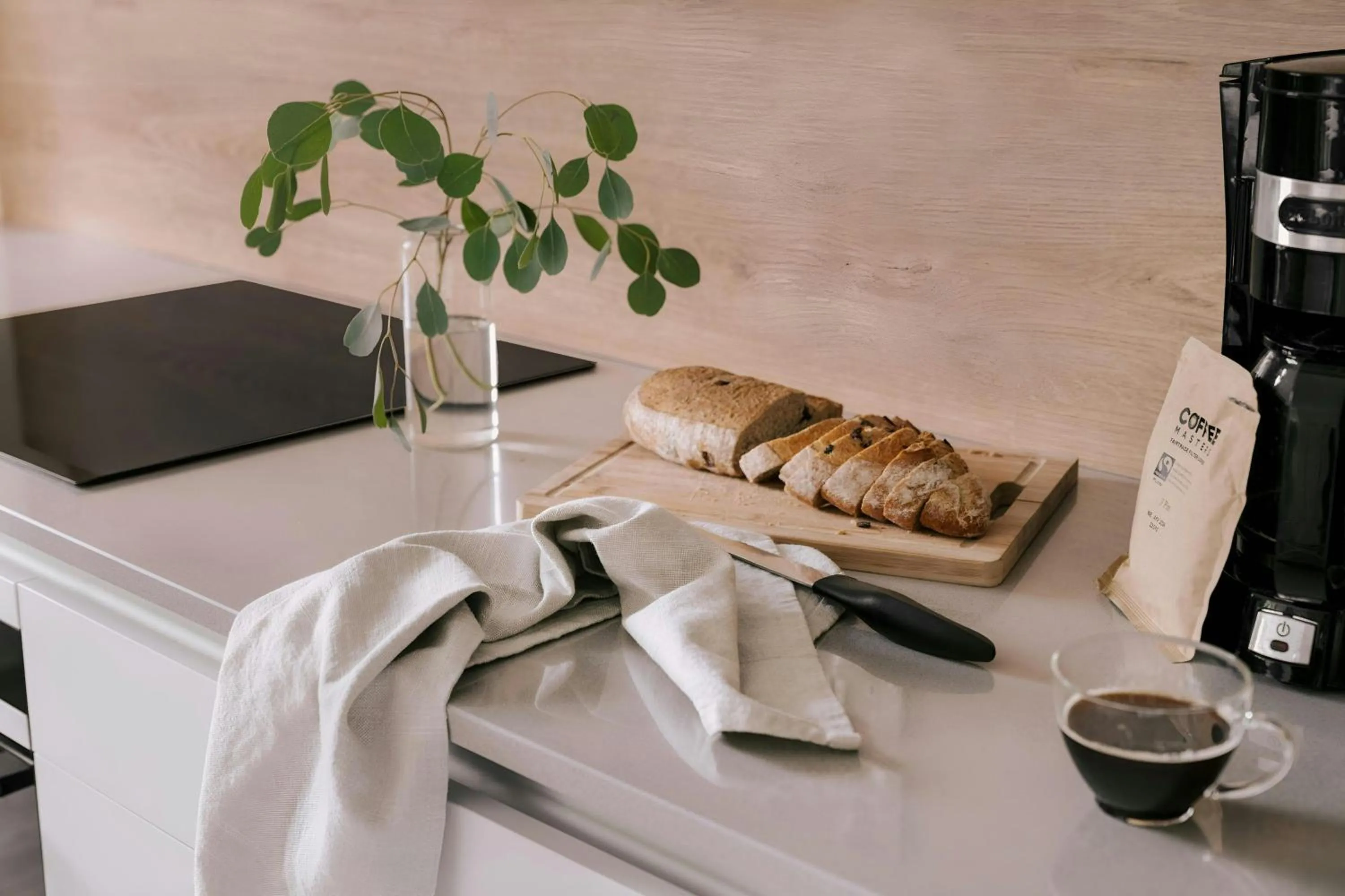 Kitchen or kitchenette in Sonder by Marriott Bonvoy Royal Garden Apartments New Town