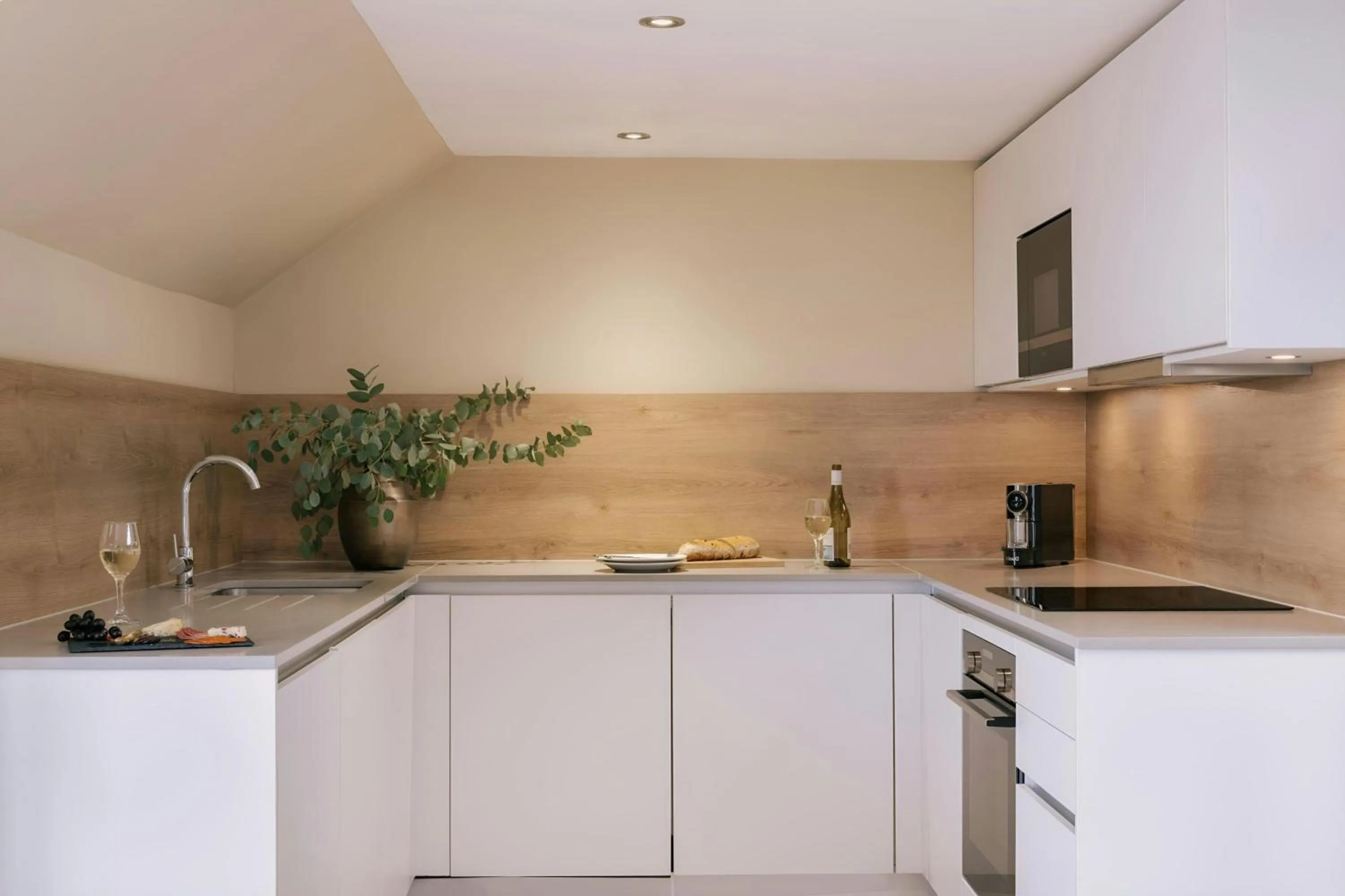 Kitchen or kitchenette in Sonder by Marriott Bonvoy Royal Garden Apartments New Town