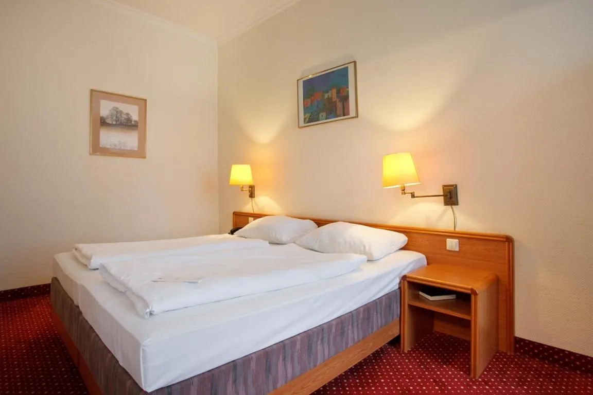 Bedroom, Bed in acom Hotel Berlin Kurfürstendamm