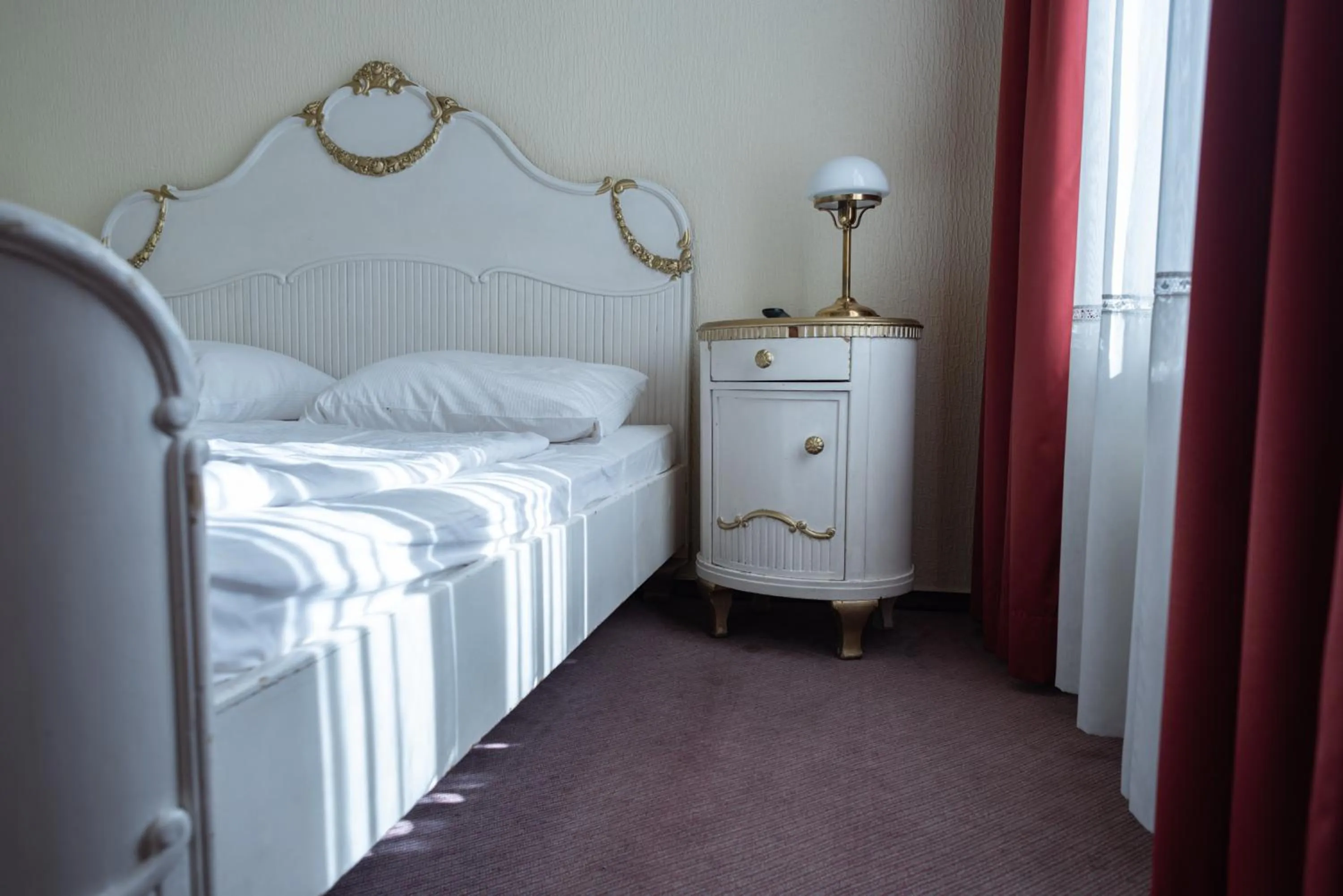 Bed in acom Hotel Berlin Kurfürstendamm