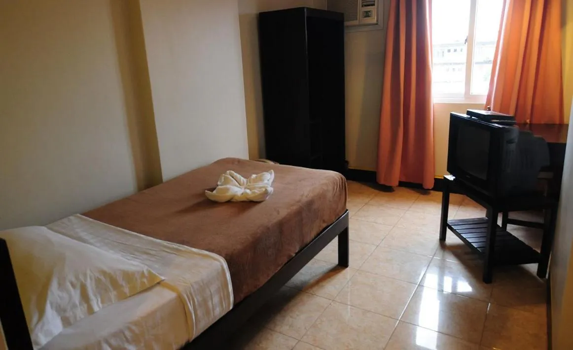 Bed in Negrense Suites