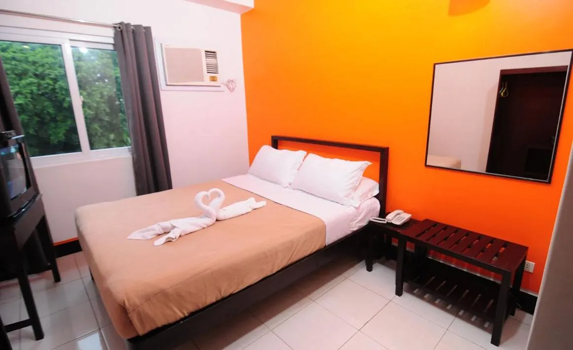 Bed in Negrense Suites