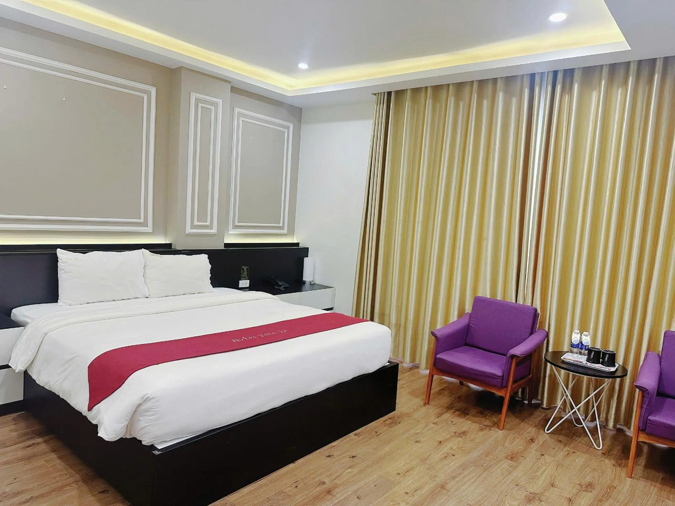 Seating area, Bed in Hotel Villa Ju