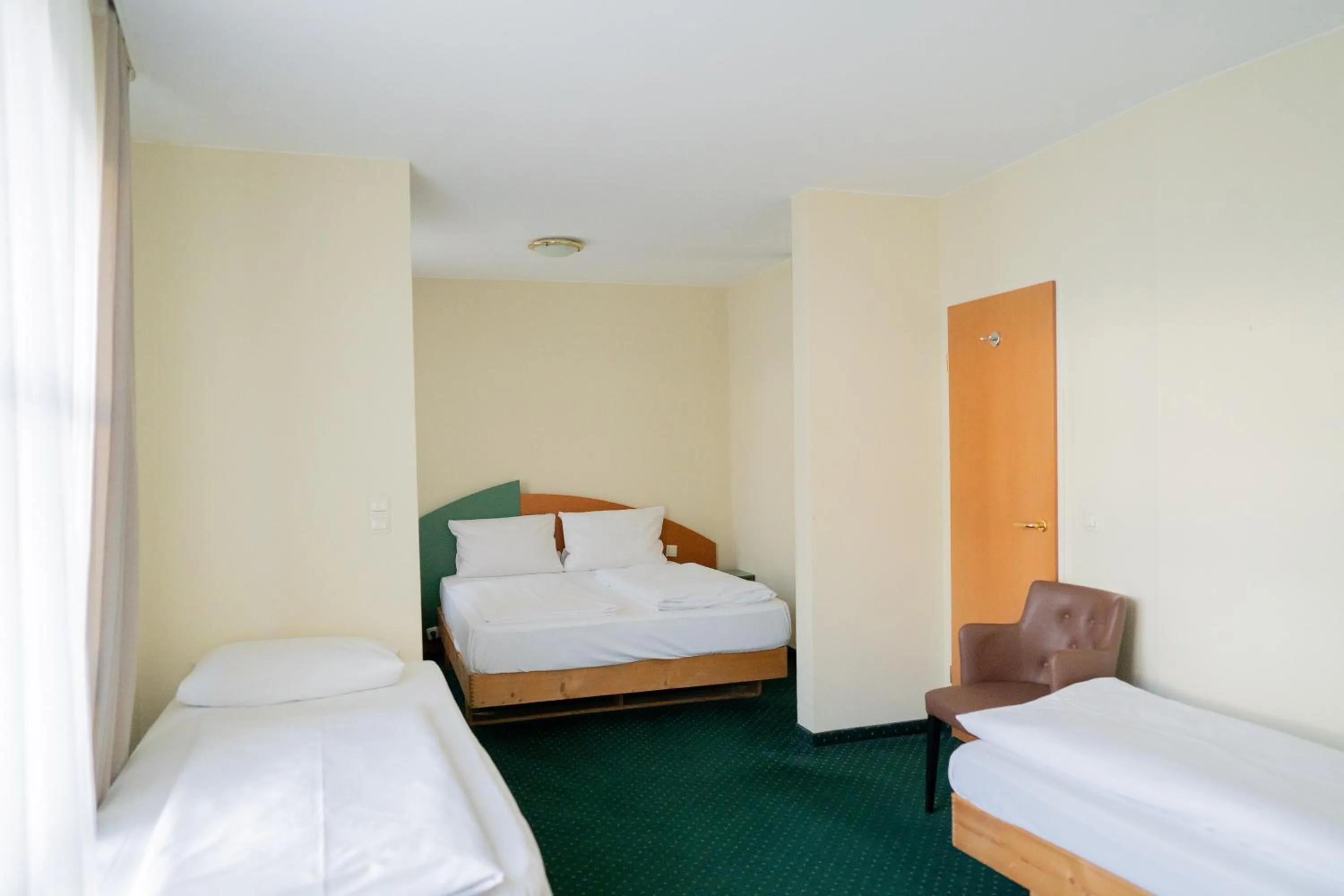 Photo of the whole room, Bed in Trip Inn Hotel Dasing-Augsburg