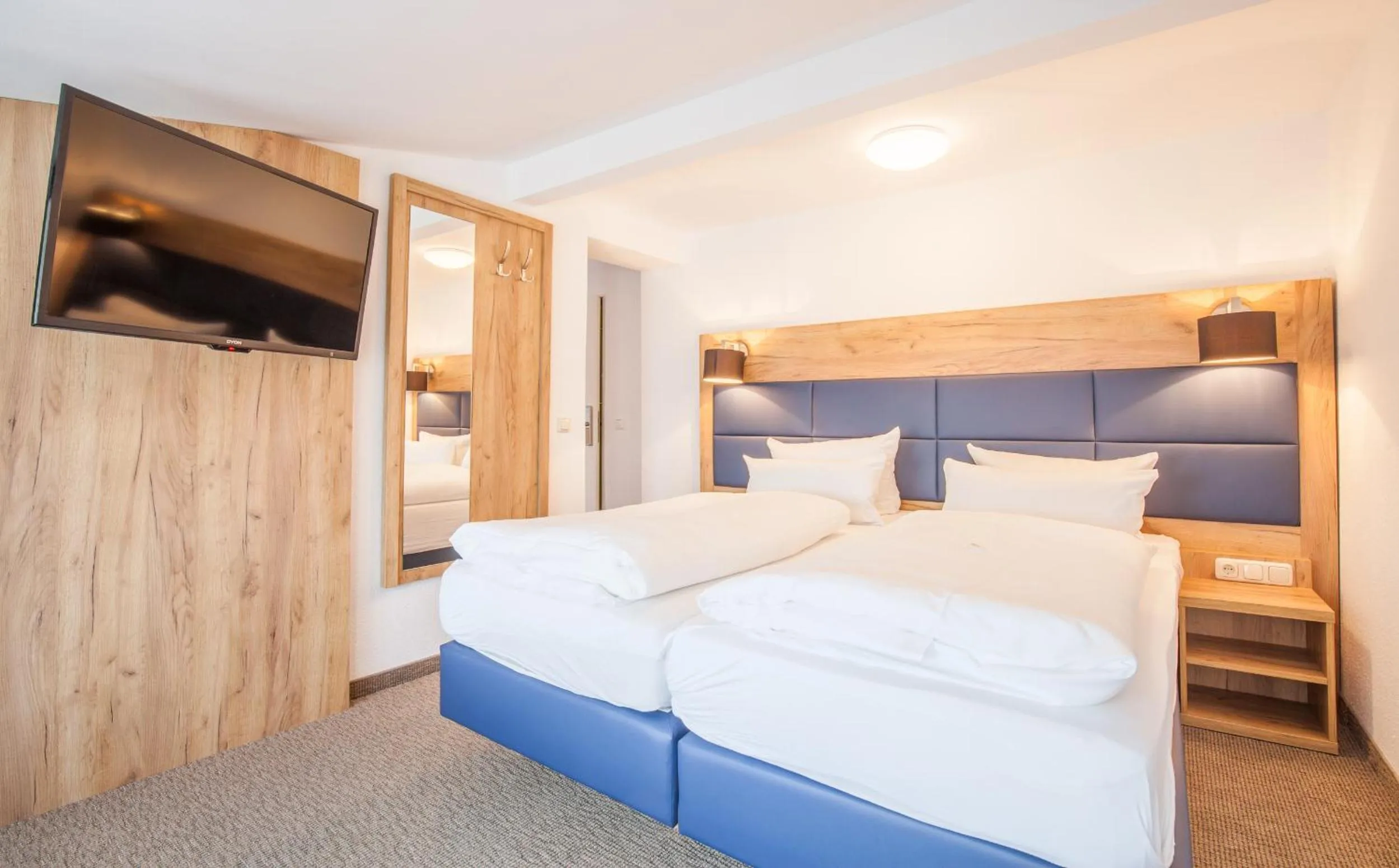 Photo of the whole room, Bed in Sure Hotel by Best Western Wilhelmshaven City