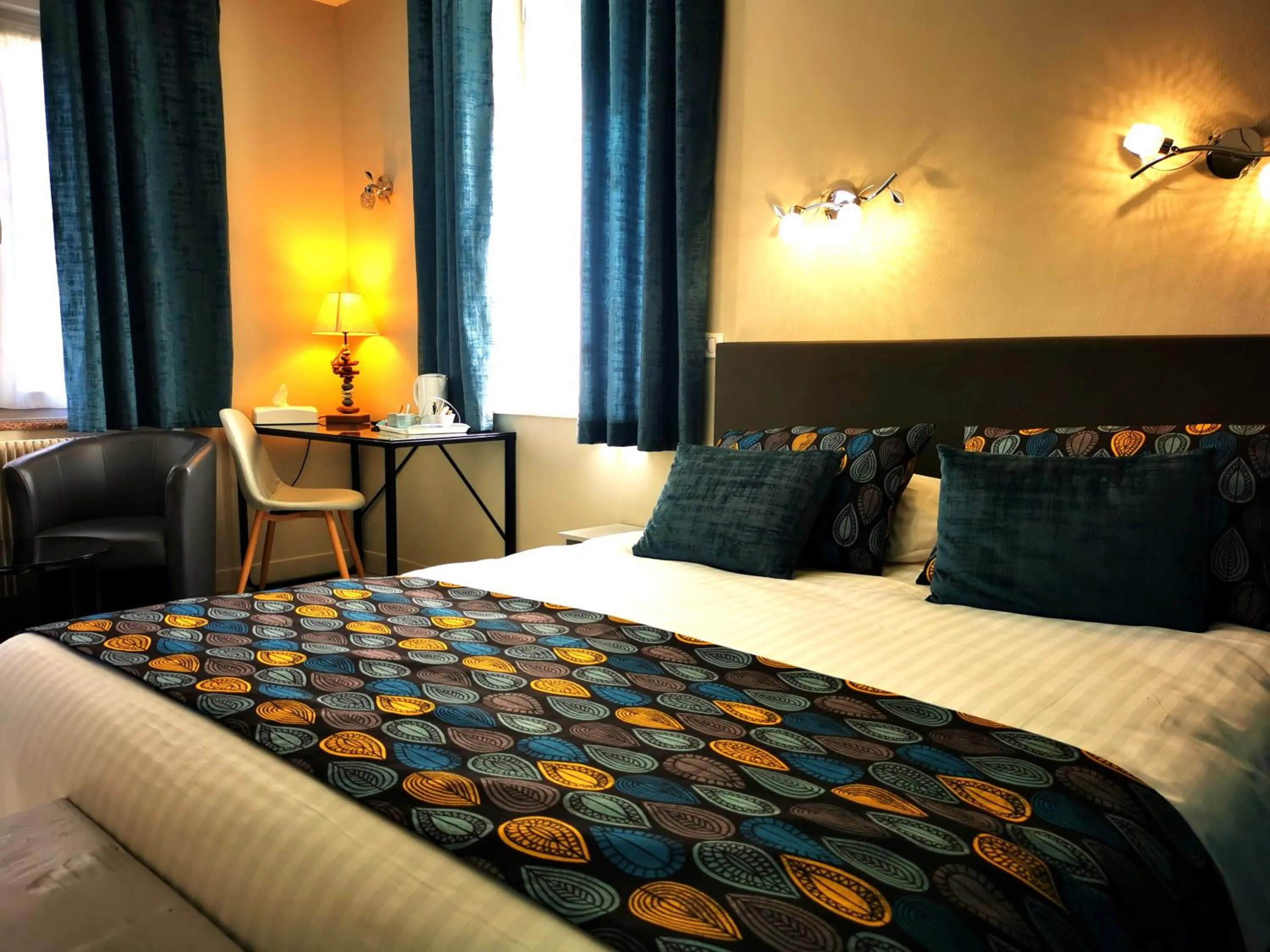 Bed in Logis Hôtel-Restaurant La Sapinière