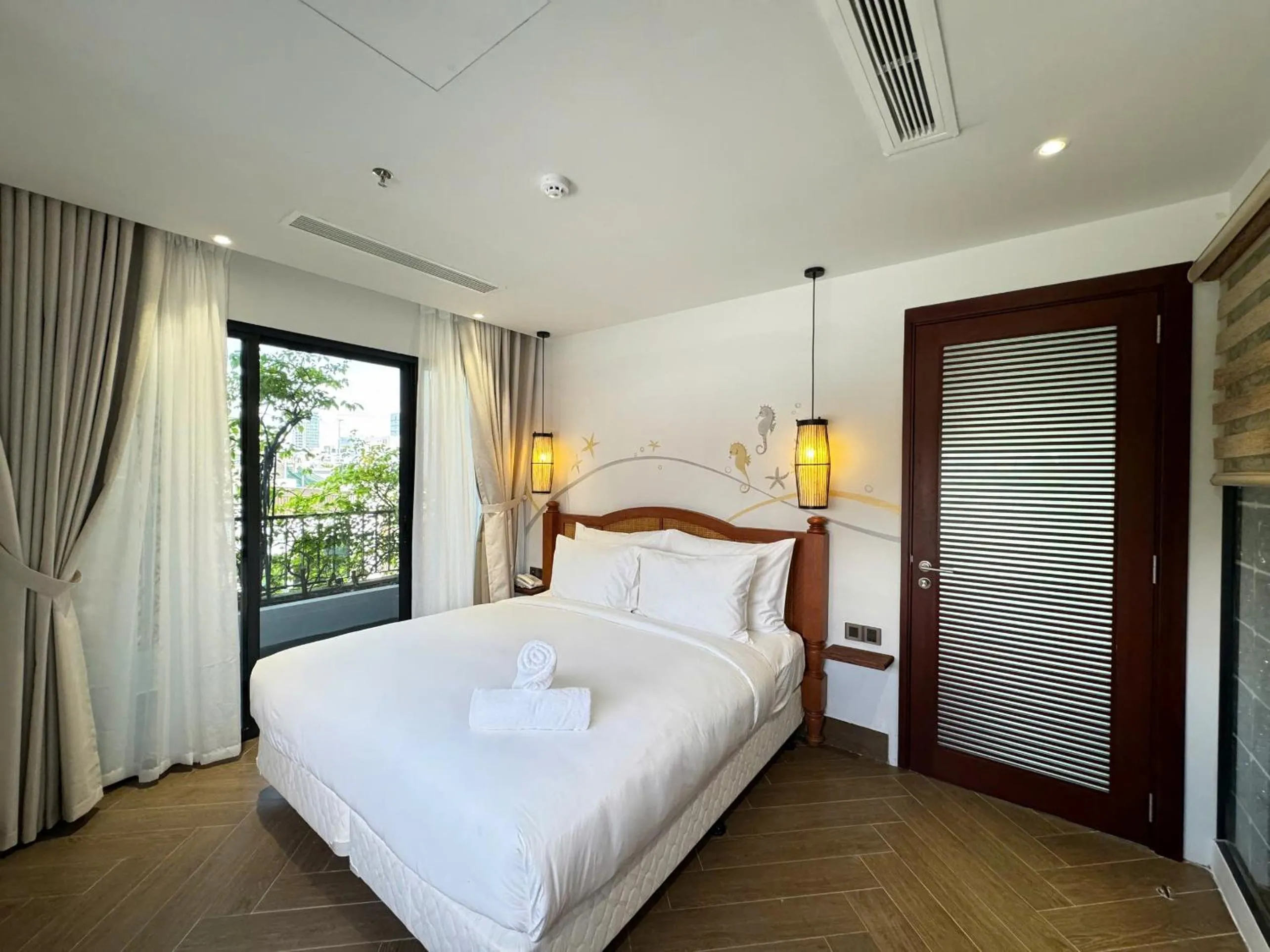 Family Suite with Balcony in Seahorse Tropical Da Nang Hotel by Haviland
